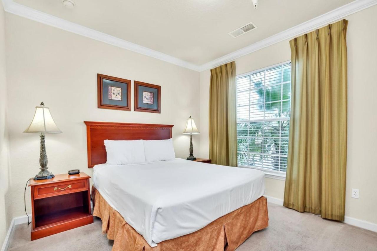 Family friendly poolside condo 15 mins to Disney view 4