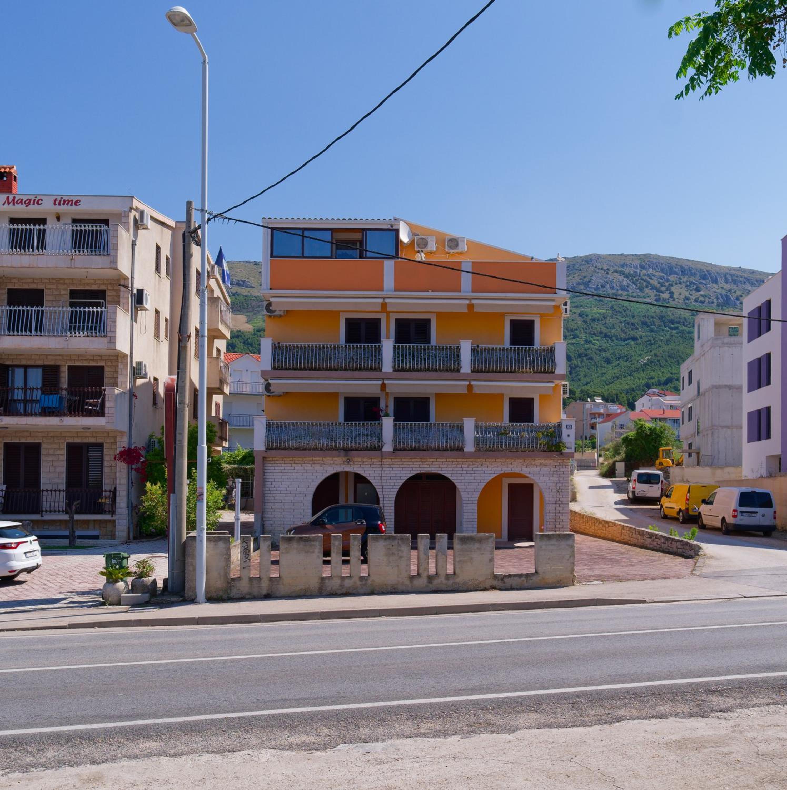 Yellow house apartments view 2