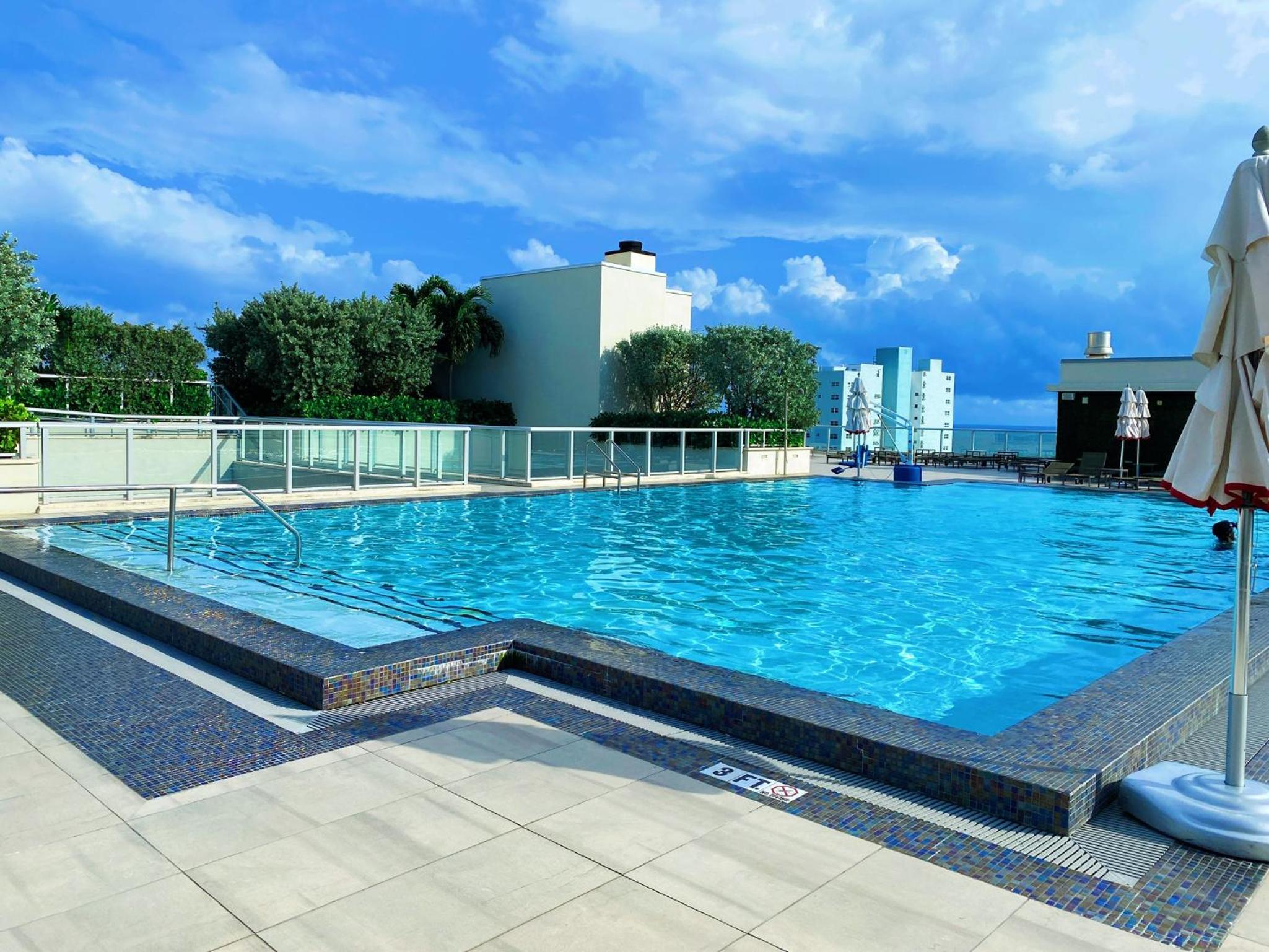 Stylish 3BR Resort Condo with Beach Access, Two Infinity Pools and Private Balcony - 25 min to FIFA! view 3