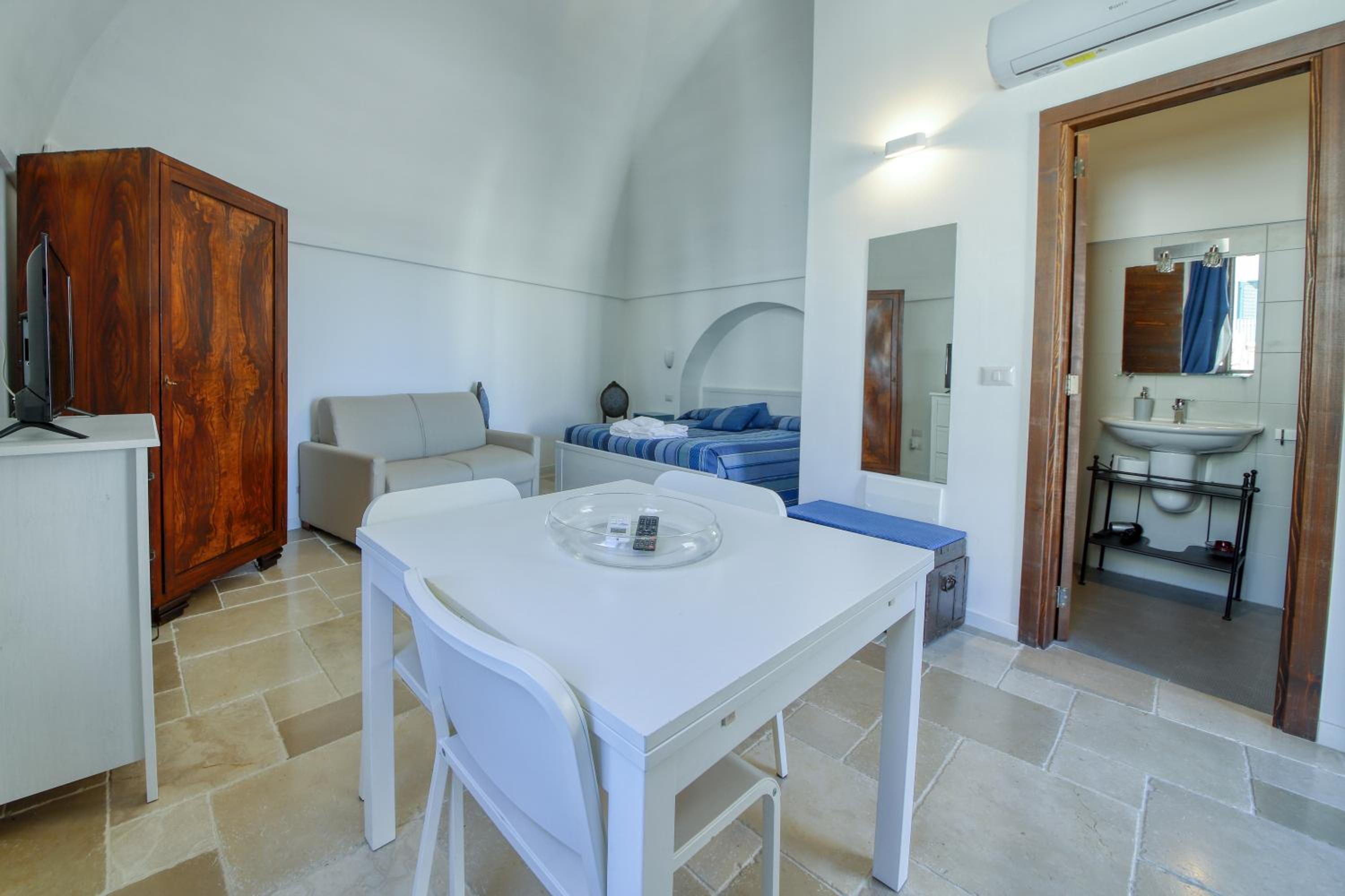 Il Melograno Apartments - Affitti Brevi Italia