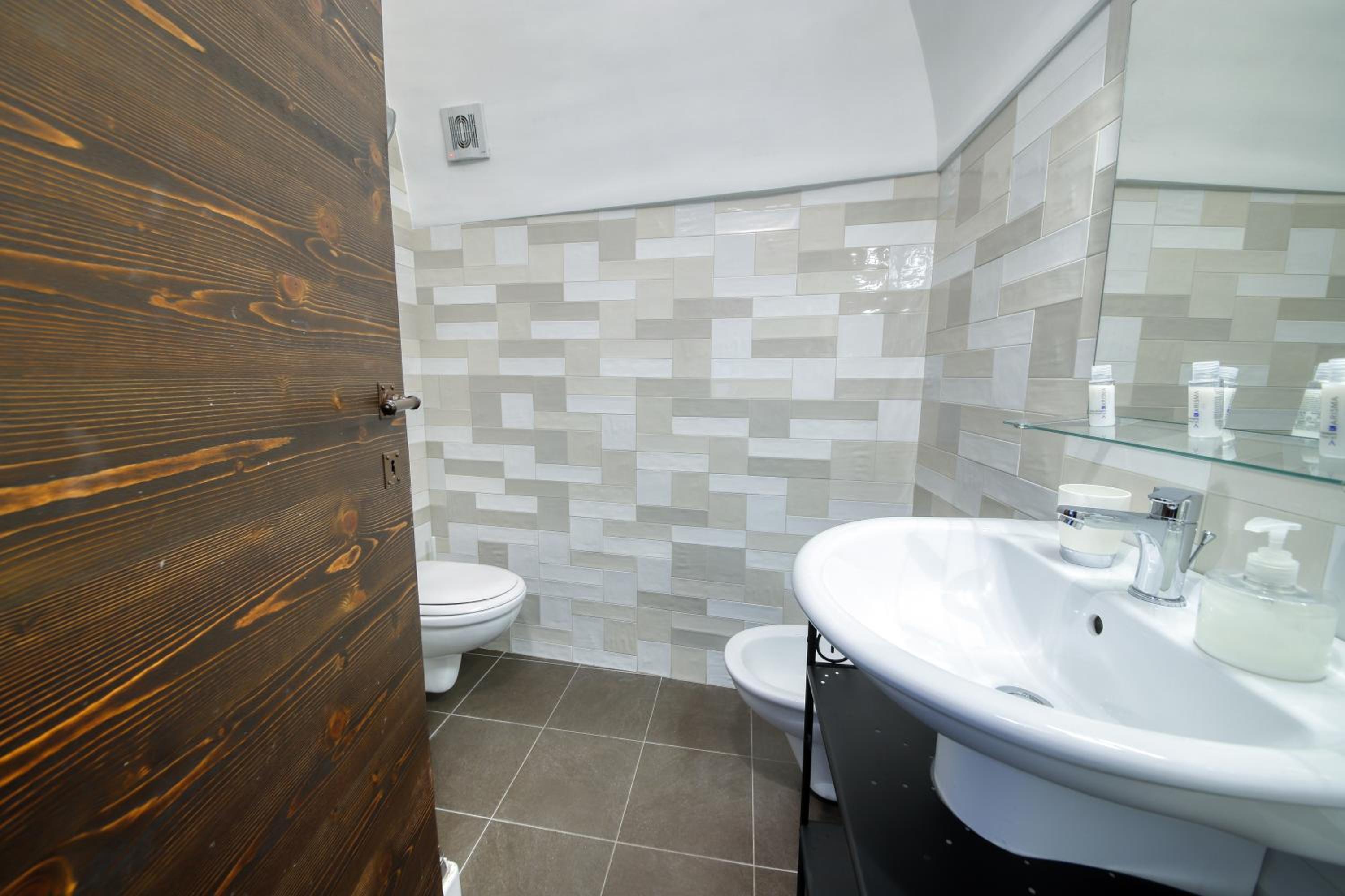 Il Melograno Apartments - Affitti Brevi Italia