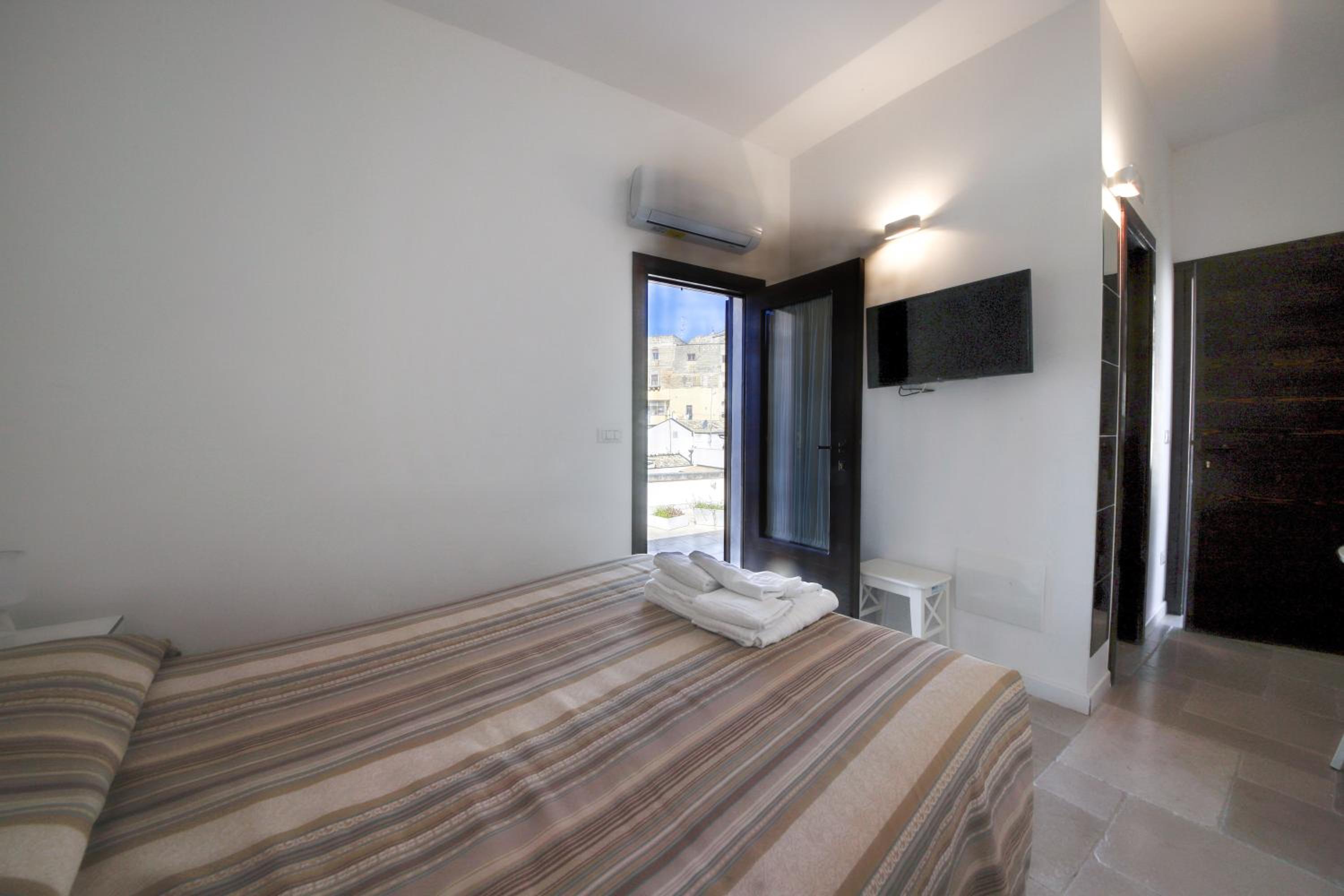 Il Melograno Apartments - Affitti Brevi Italia