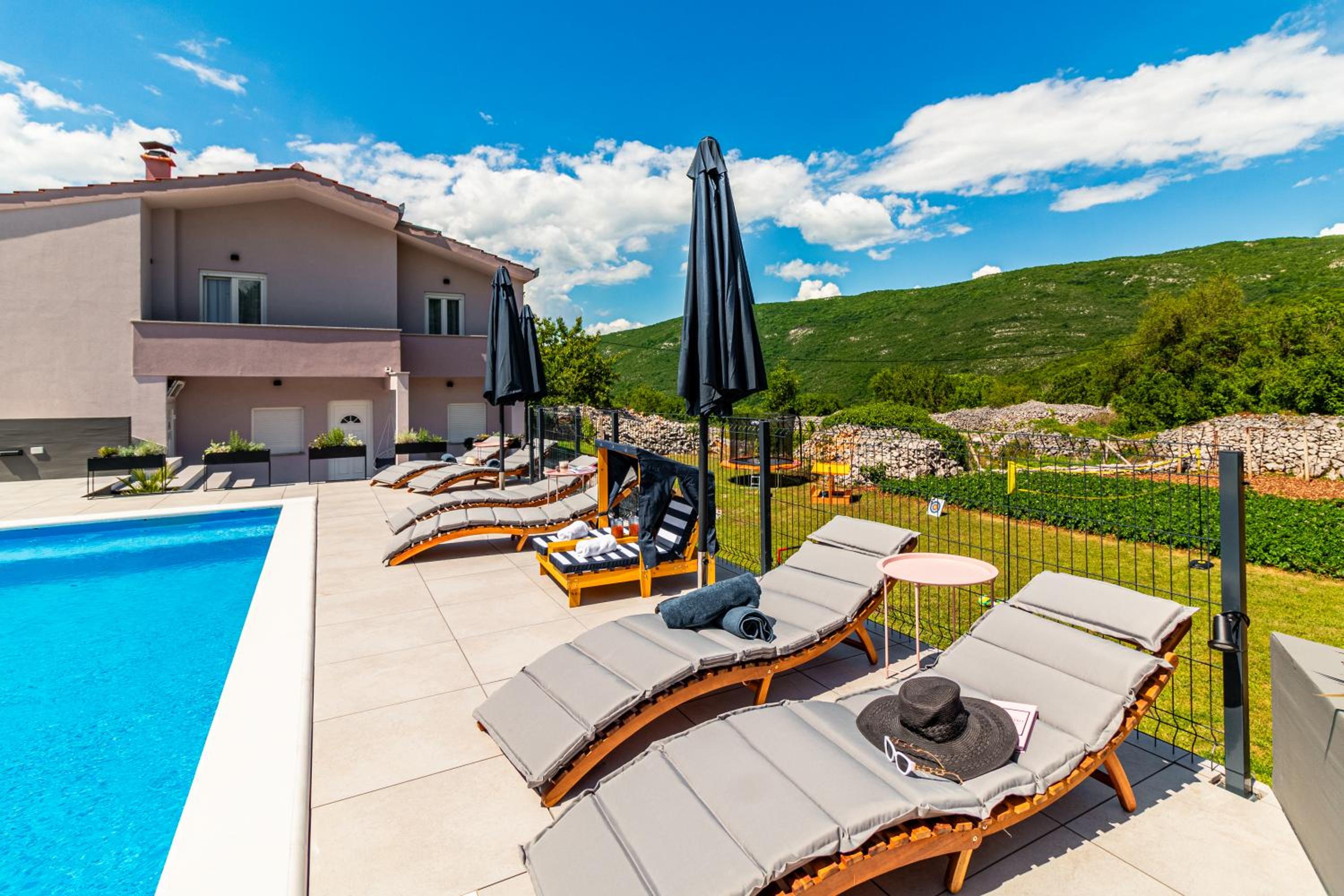 Jackal Holiday House with a heated pool and a jacuzzi