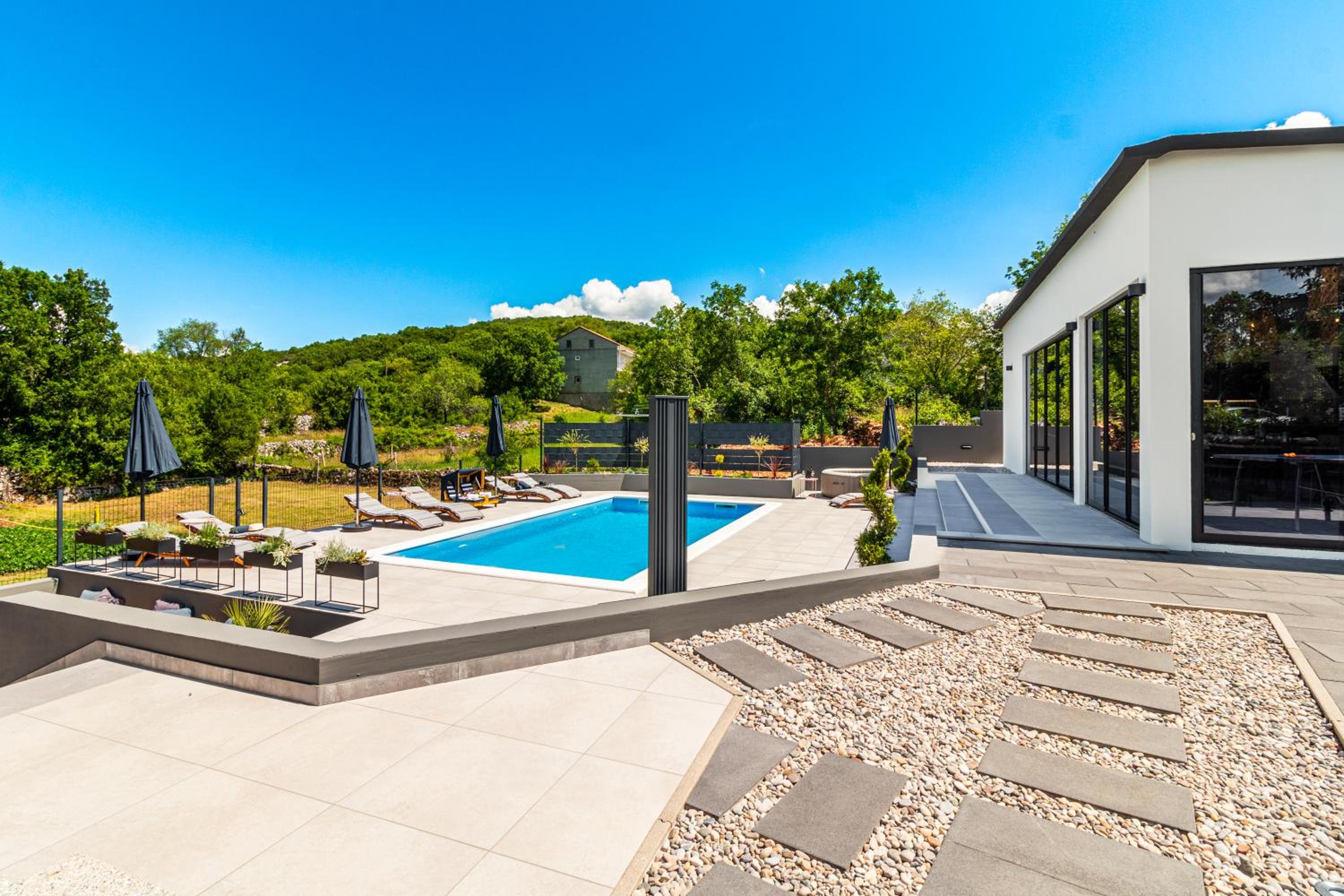 Jackal Holiday House with a heated pool and a jacuzzi