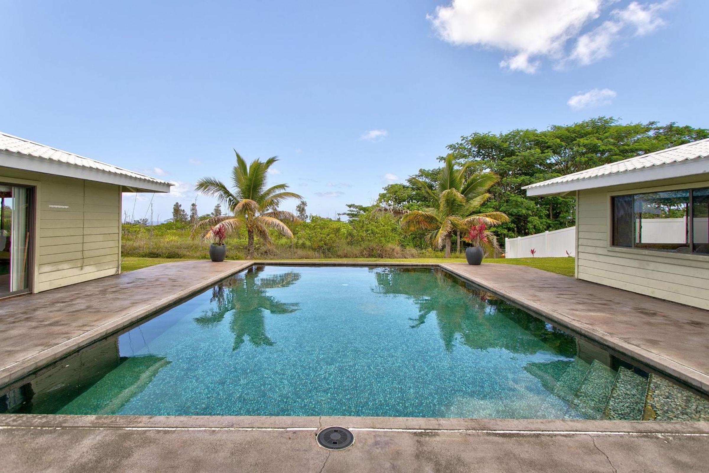 Pool house in paradise view 2
