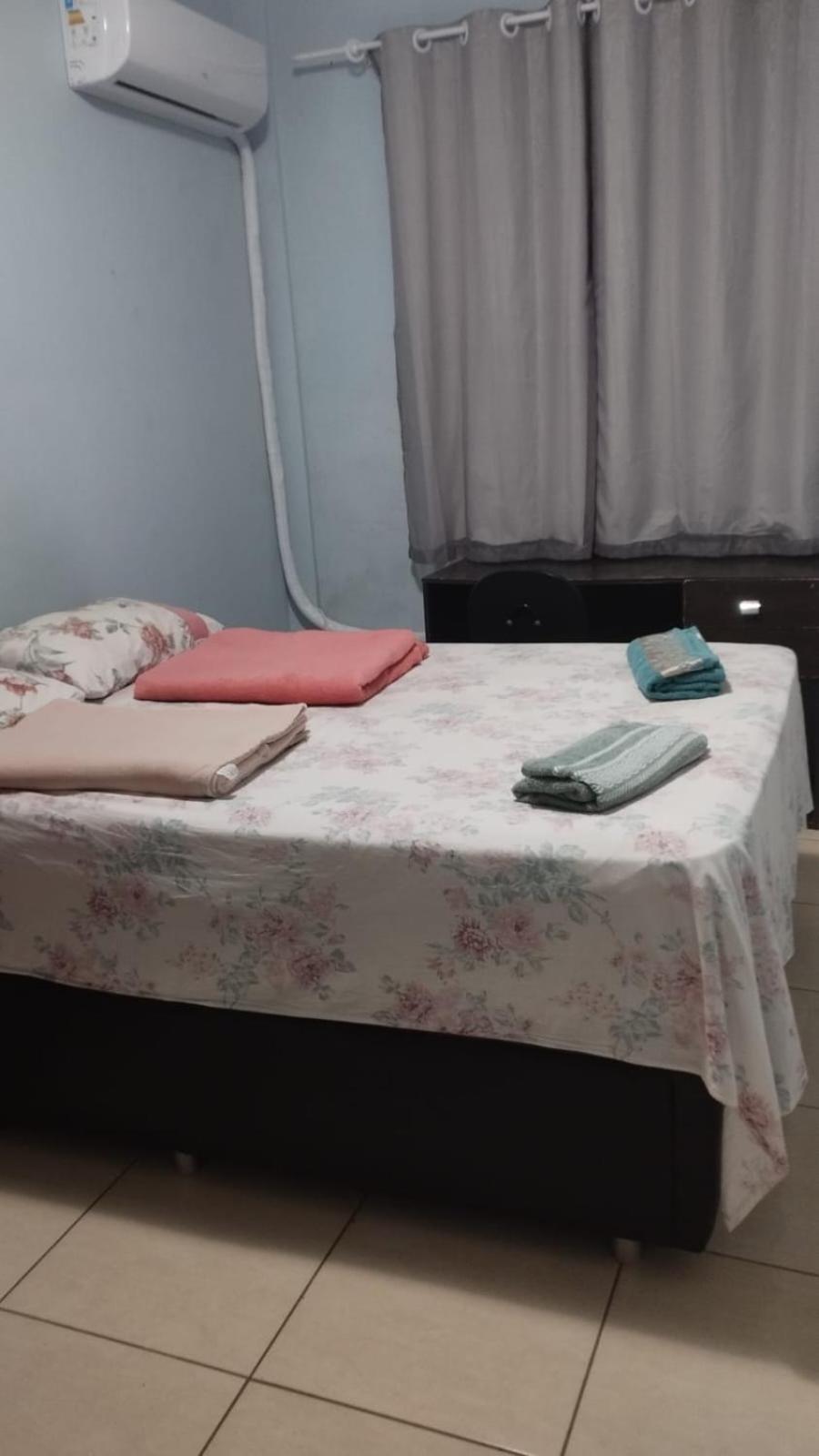 Quarto privativo em apartamento compartilhado