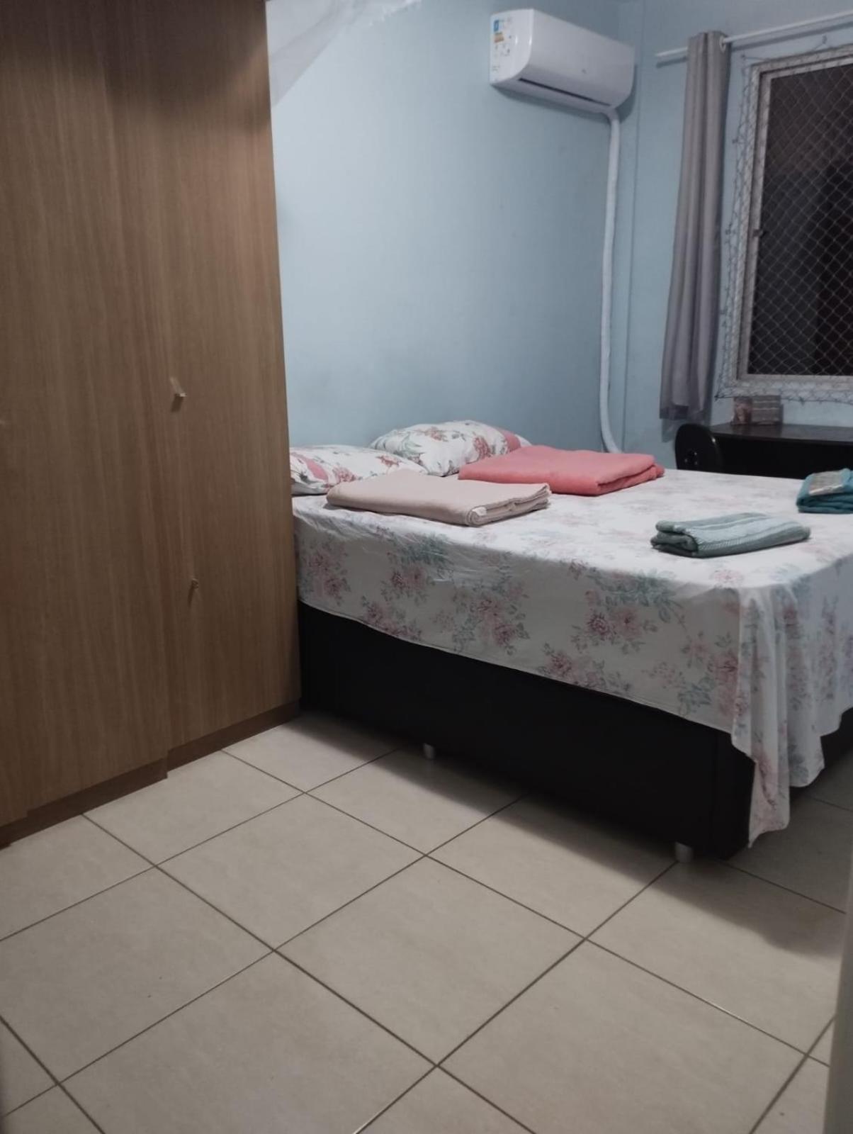 Quarto privativo em apartamento compartilhado