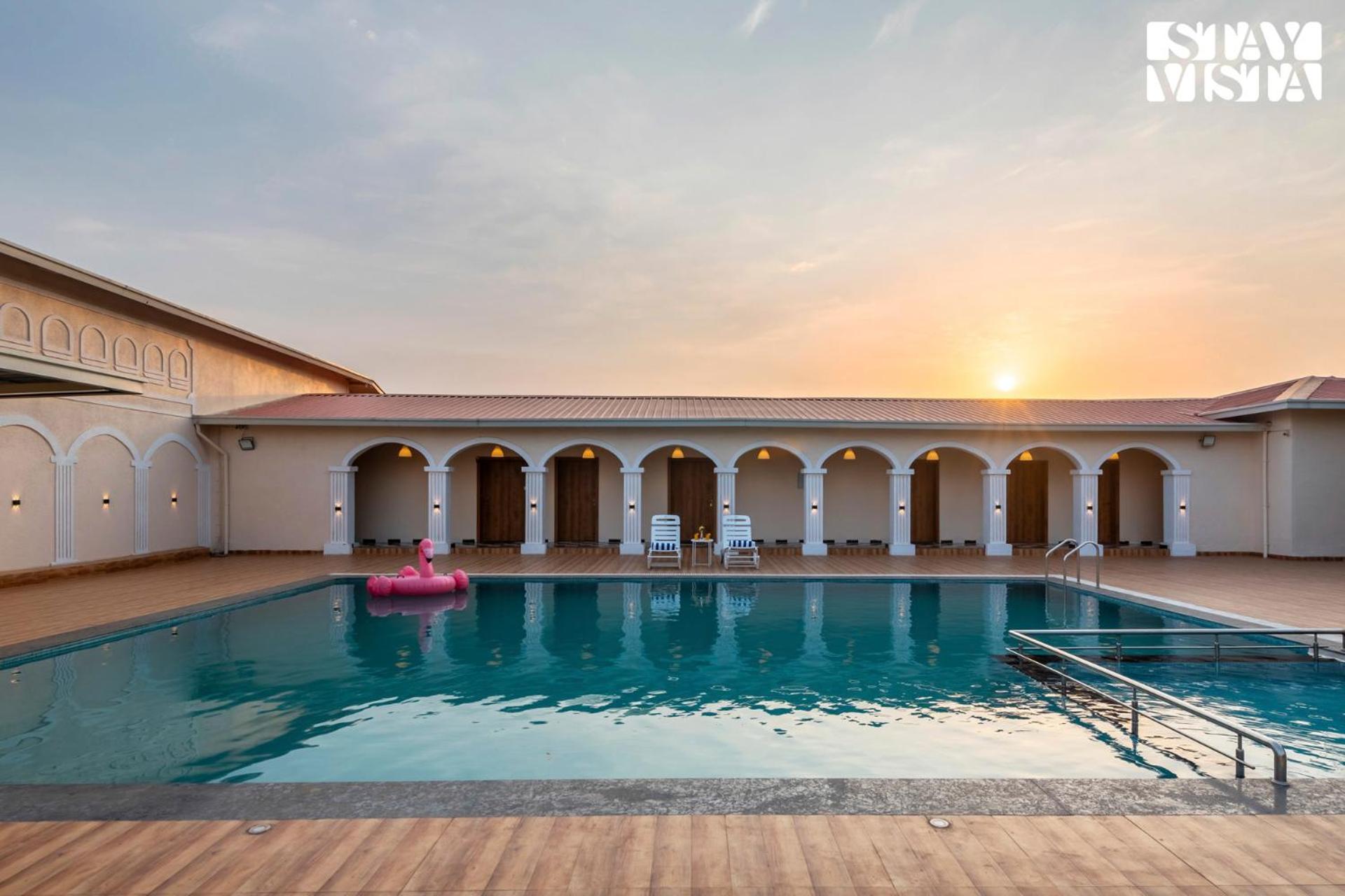 StayVista at Rio Vista with Pool, Lawn, Music Speaker & Game view 4