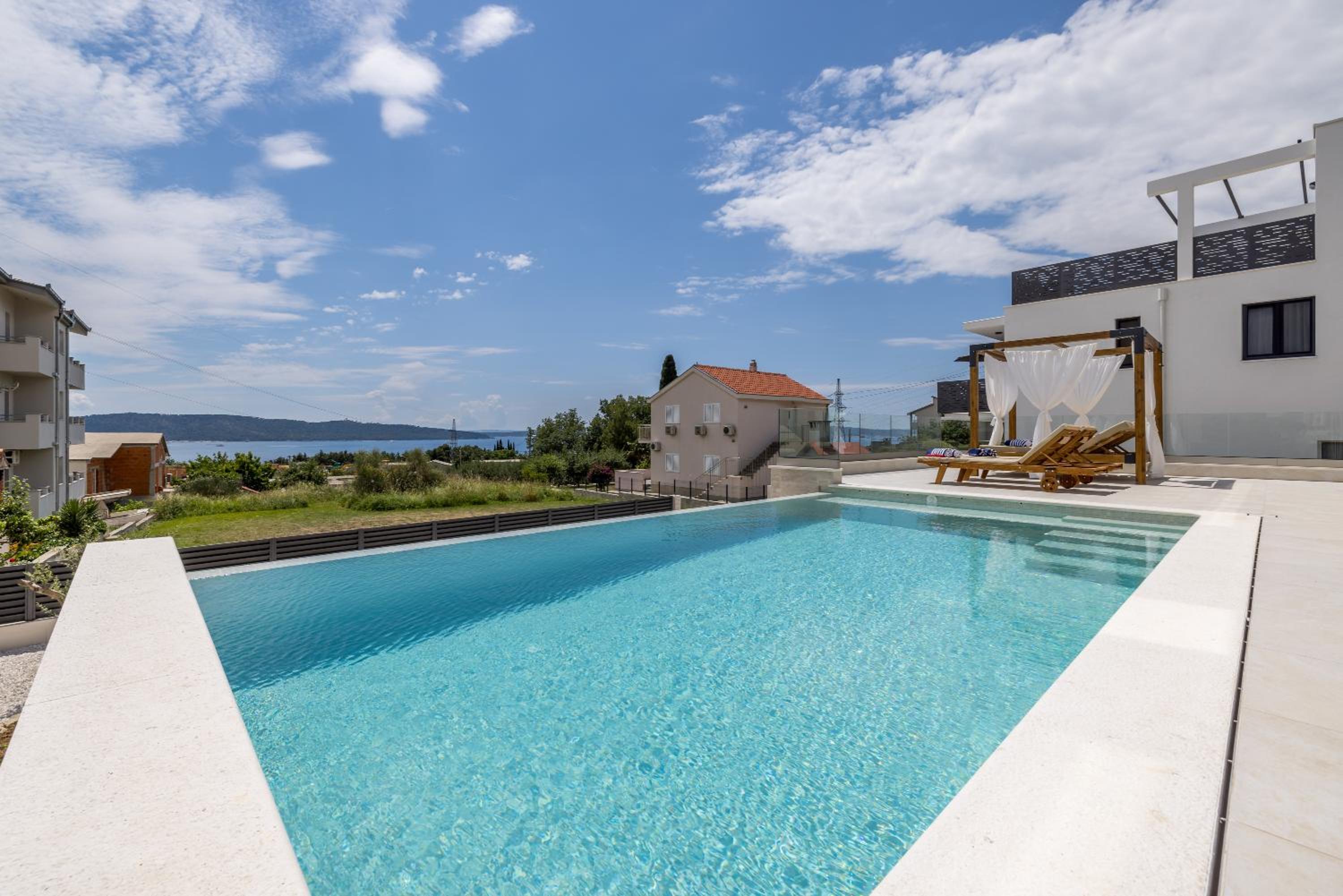 New Villa Coco Maison with heated infinity pool view 2