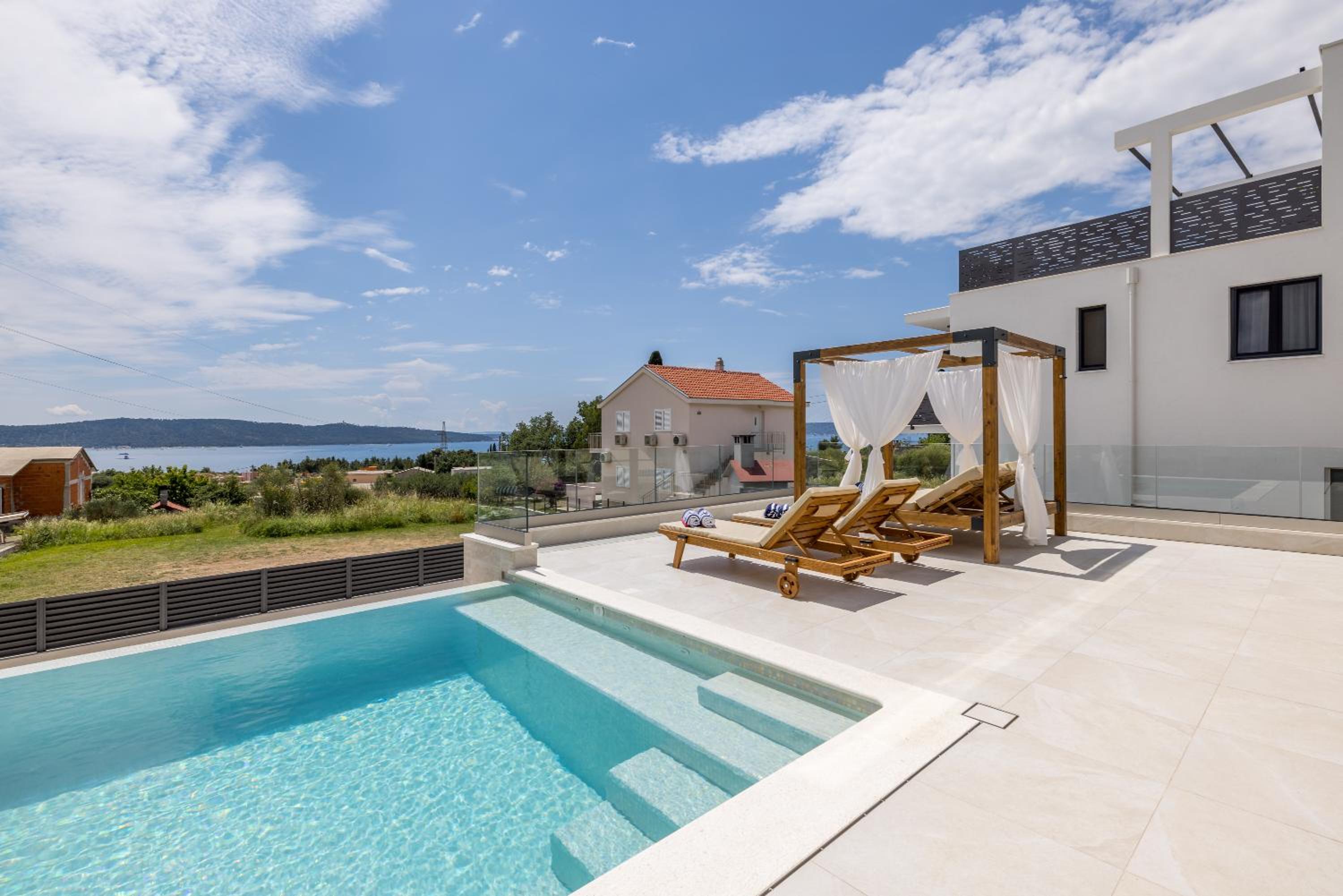 New Villa Coco Maison with heated infinity pool view 3