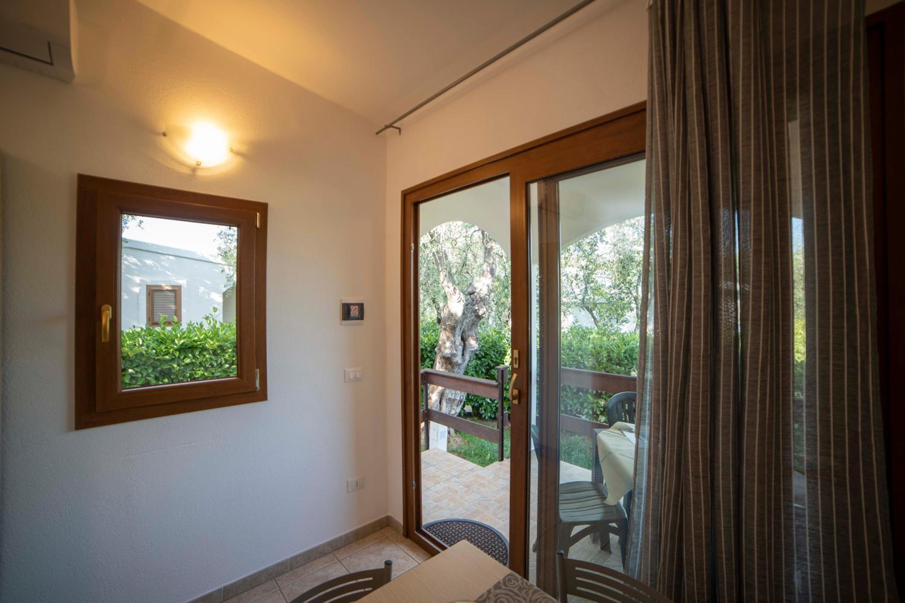 Holiday Apartment orchidea with swimming pool and private beach view 2