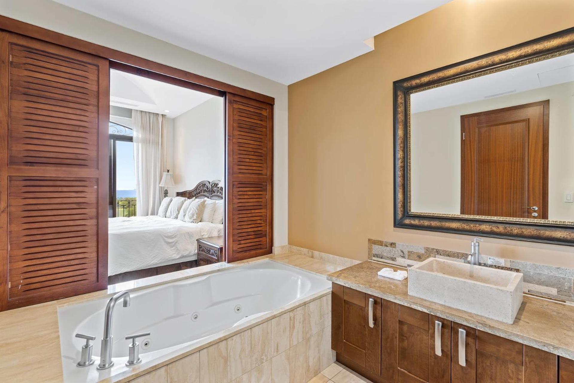 Stunning Luxury Penthouse in Exclusive Beachfront Community with Resort-Style Amenities & Sweeping Views of the Ocean & Golf Course