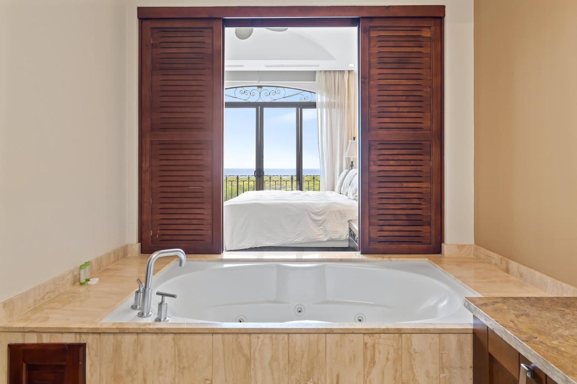 Stunning Luxury Penthouse in Exclusive Beachfront Community with Resort-Style Amenities & Sweeping Views of the Ocean & Golf Course