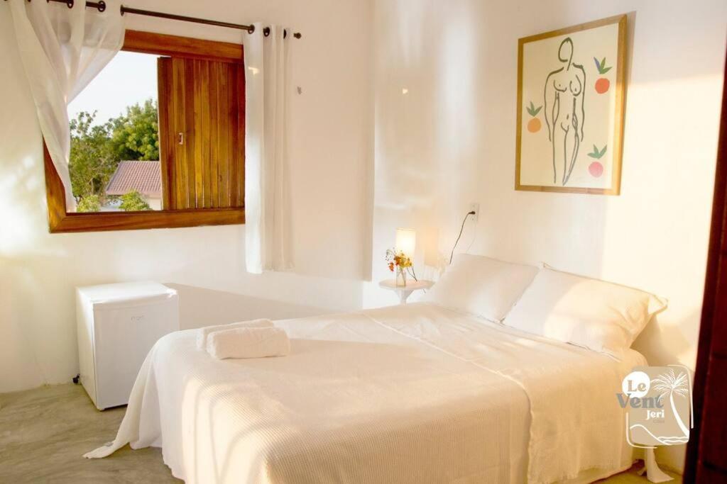 Casa de charme com 5 suites e piscina , a 5 minutos a pe da praia e do centro de Jericoacoara