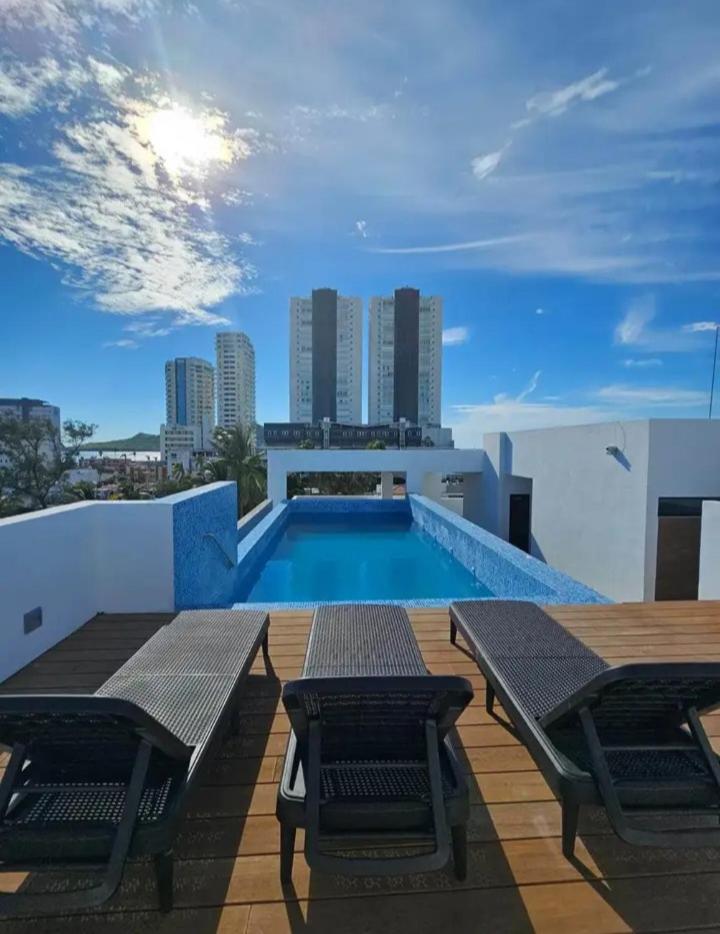 Zona dorada Alberca comodidad playa view 3