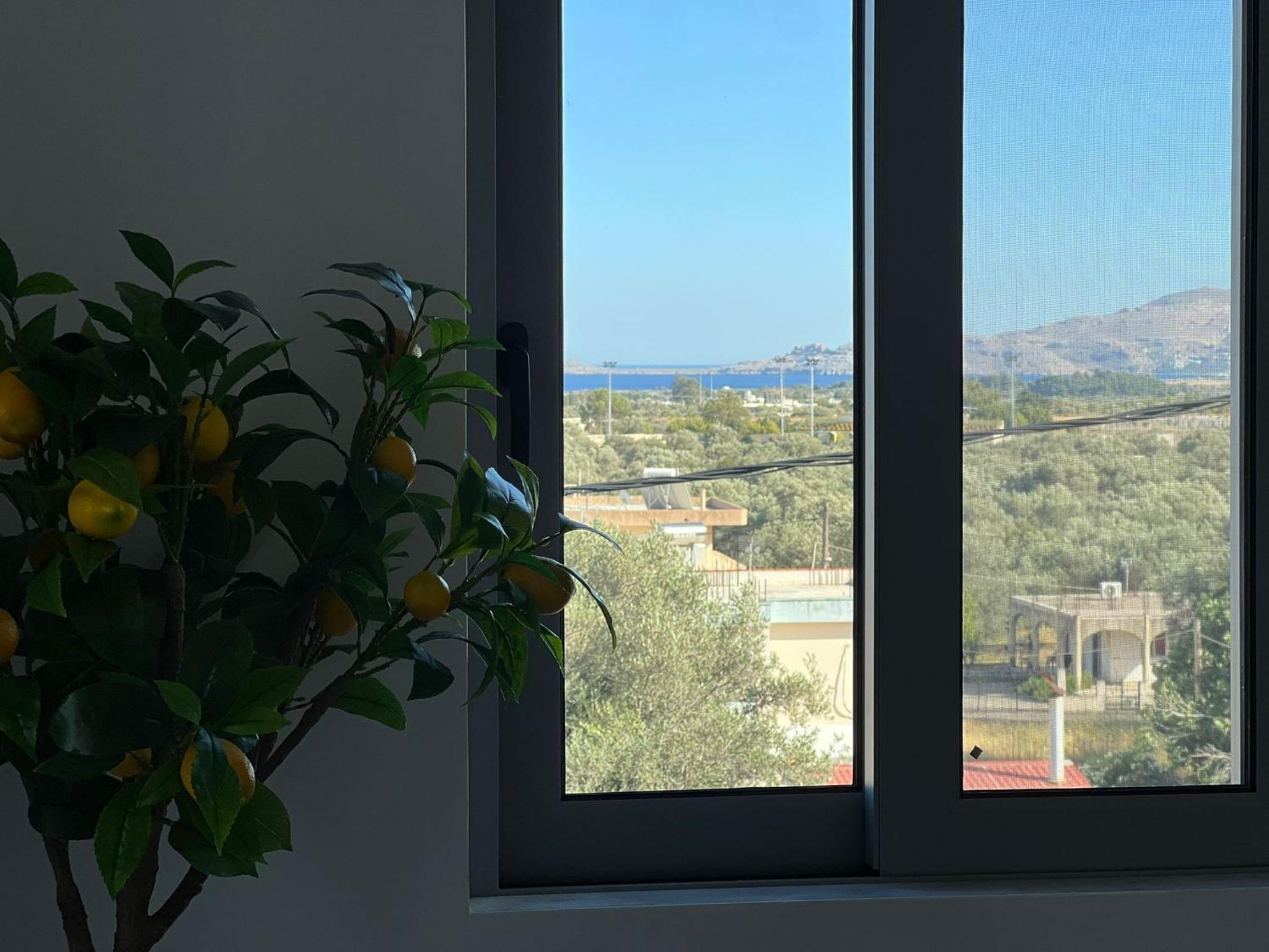 ARYVE Townhouse Rhodos mit Akropolis- und Meerblick sowie Jacuzzi und tollen Sonnenterrassen und Garten view 4