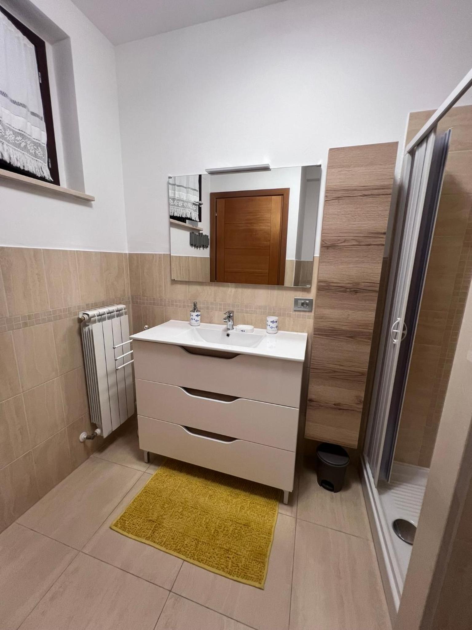 Casa Antia, nuovo bilocale con giardino in Residence con piscina