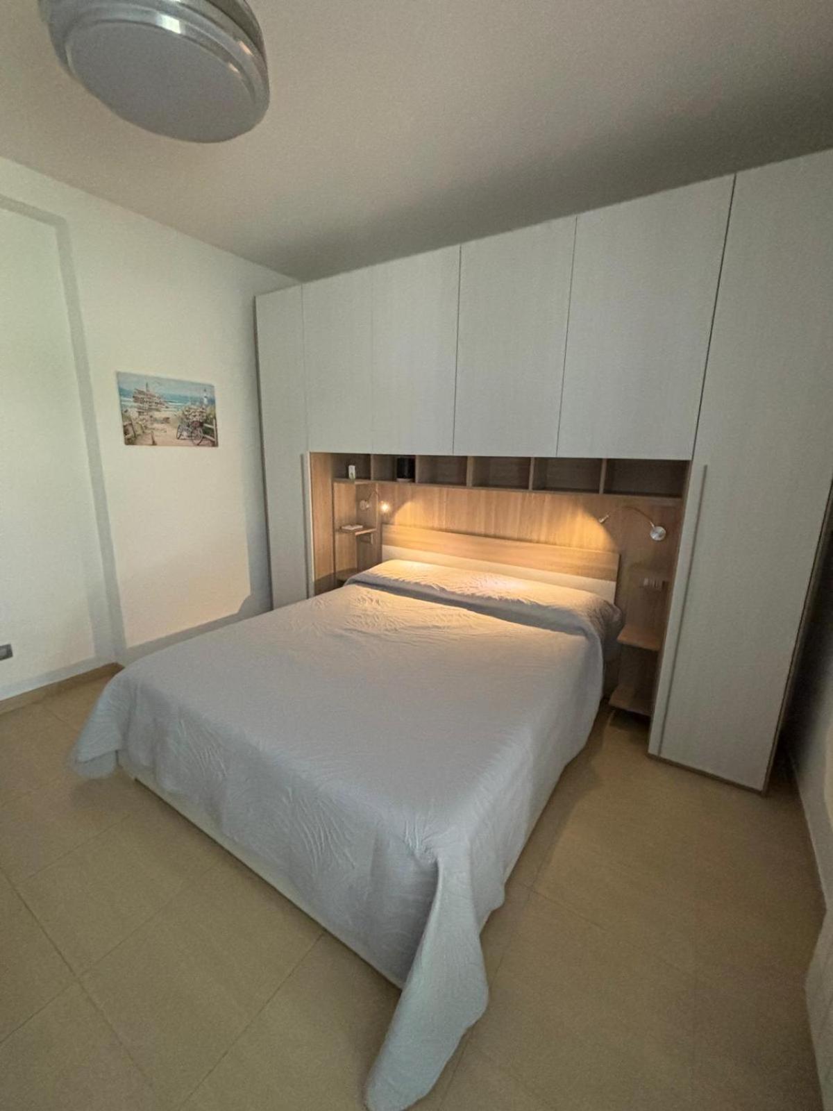 Casa Antia, nuovo bilocale con giardino in Residence con piscina