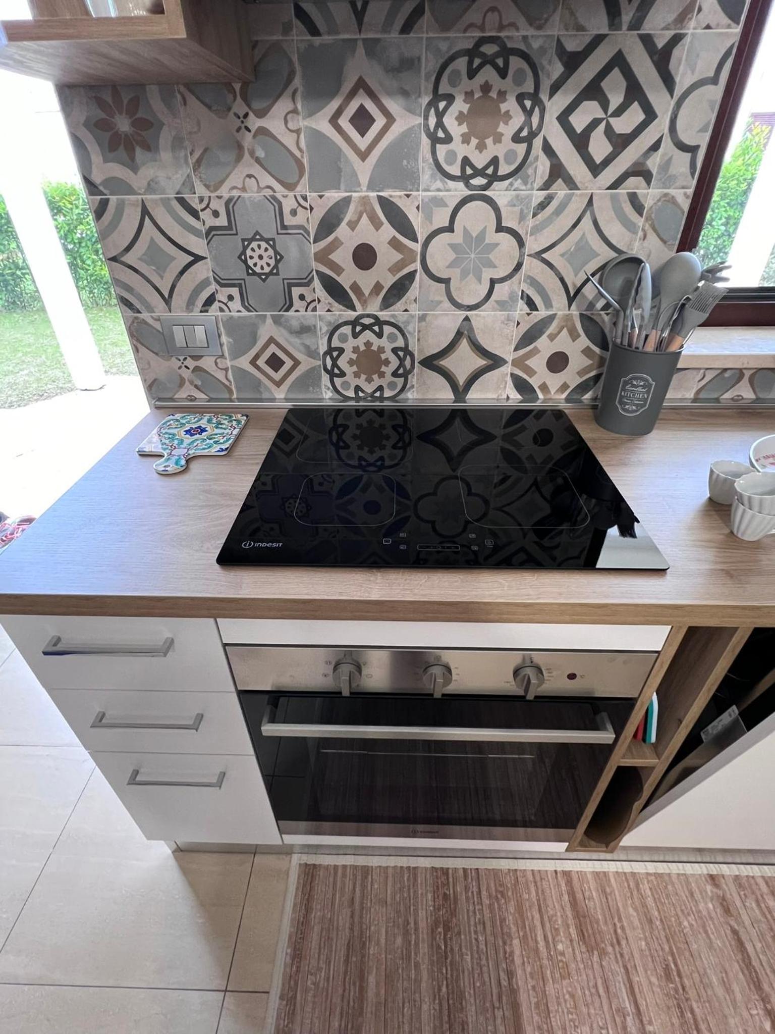 Casa Antia, nuovo bilocale con giardino in Residence con piscina