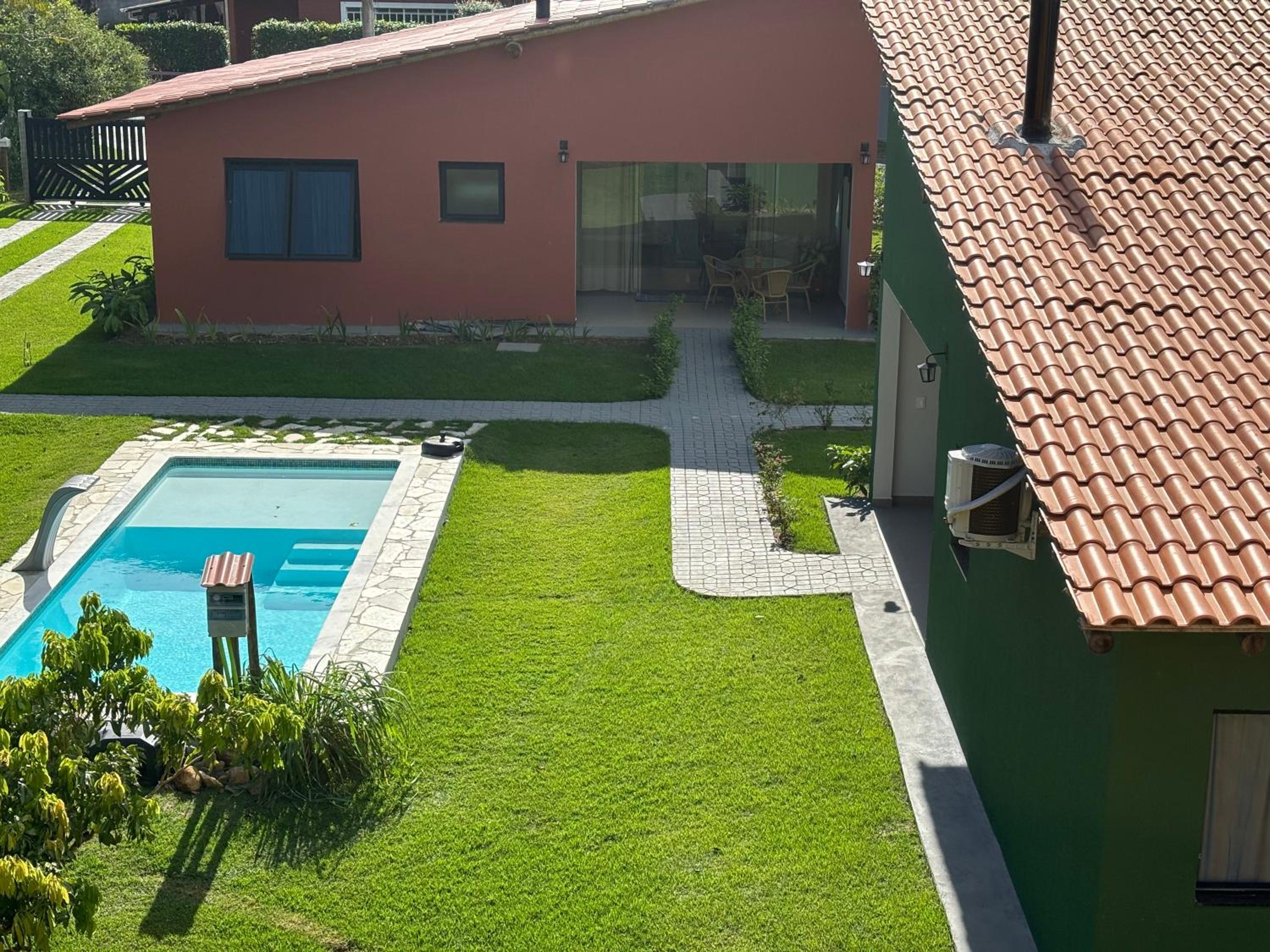 Casas aconchegantes com piscina na encantadora Praia das Cigarras