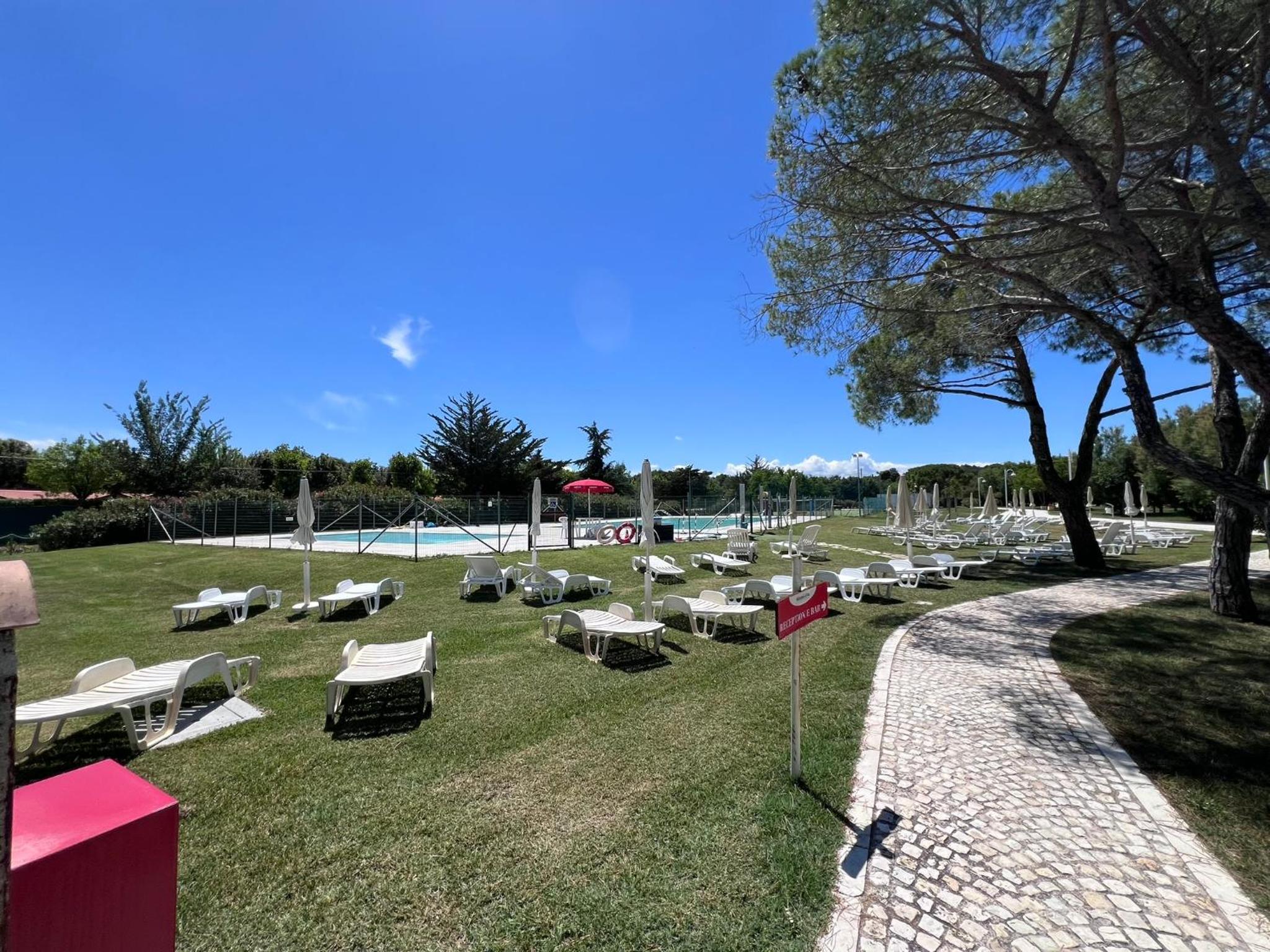 Casa Antia, nuovo bilocale con giardino in Residence con piscina