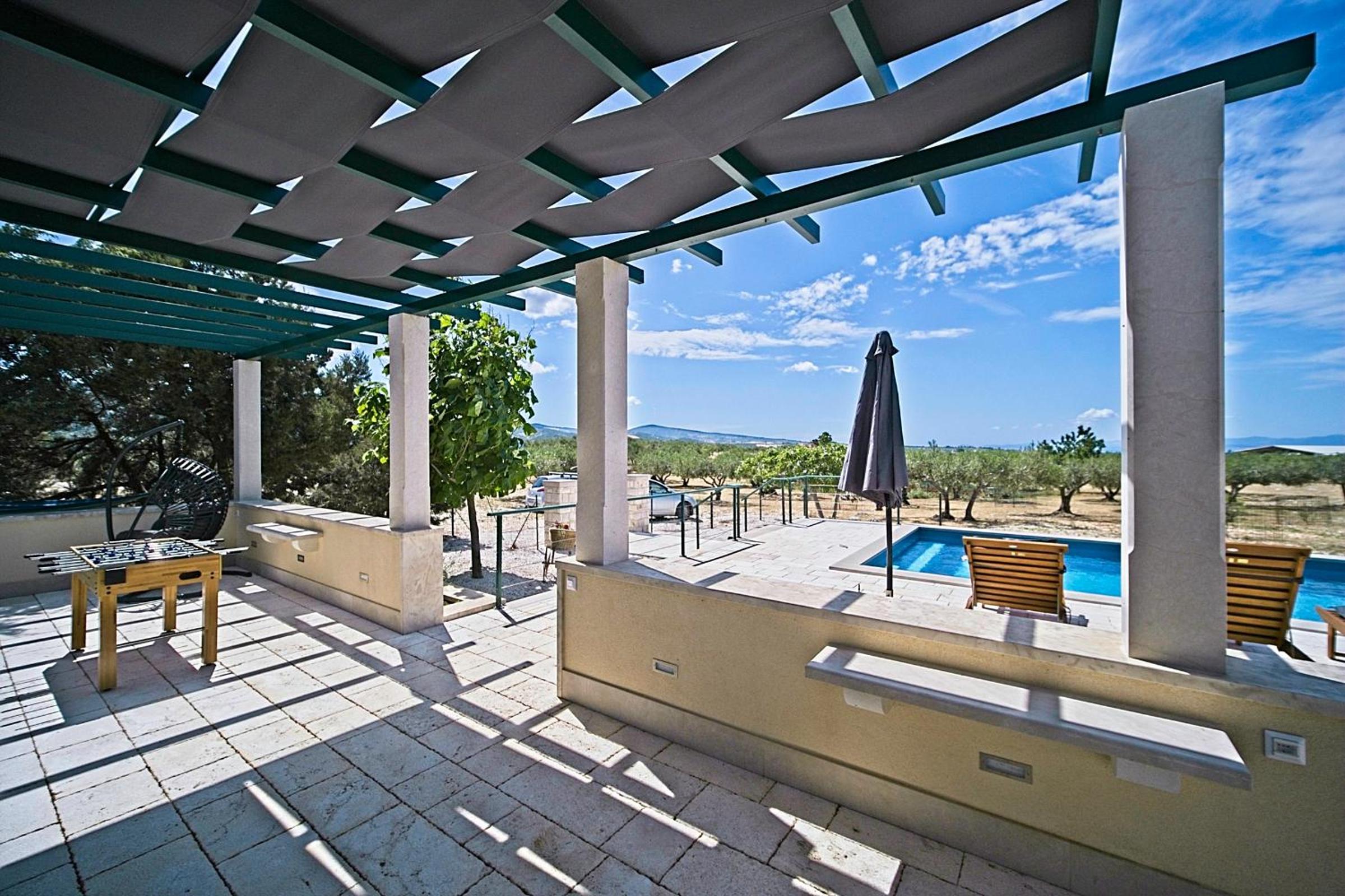 Secluded vacation house Bračuta with swimming pool view 4