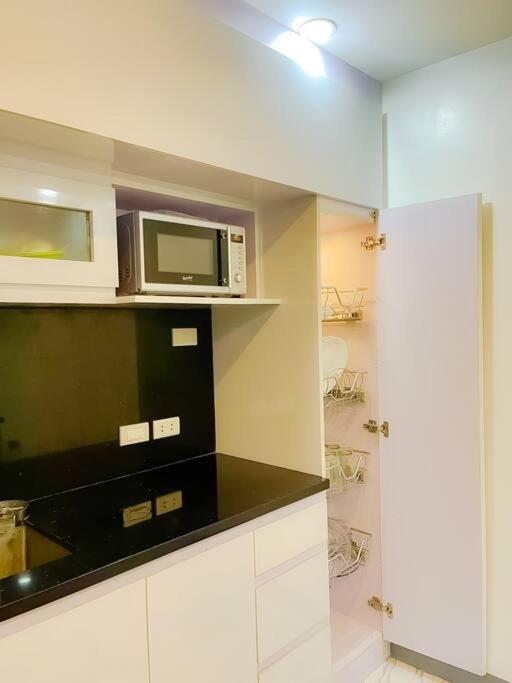 Cai Residence - Stylish 2BR Staycation near EK & Tagaytay Gateway view 3