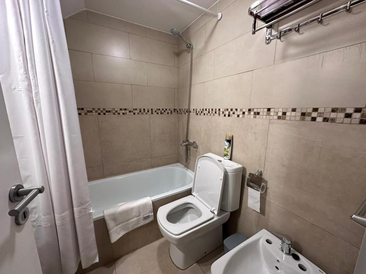 Aunaisin - Apartamentos 9 de julio 52