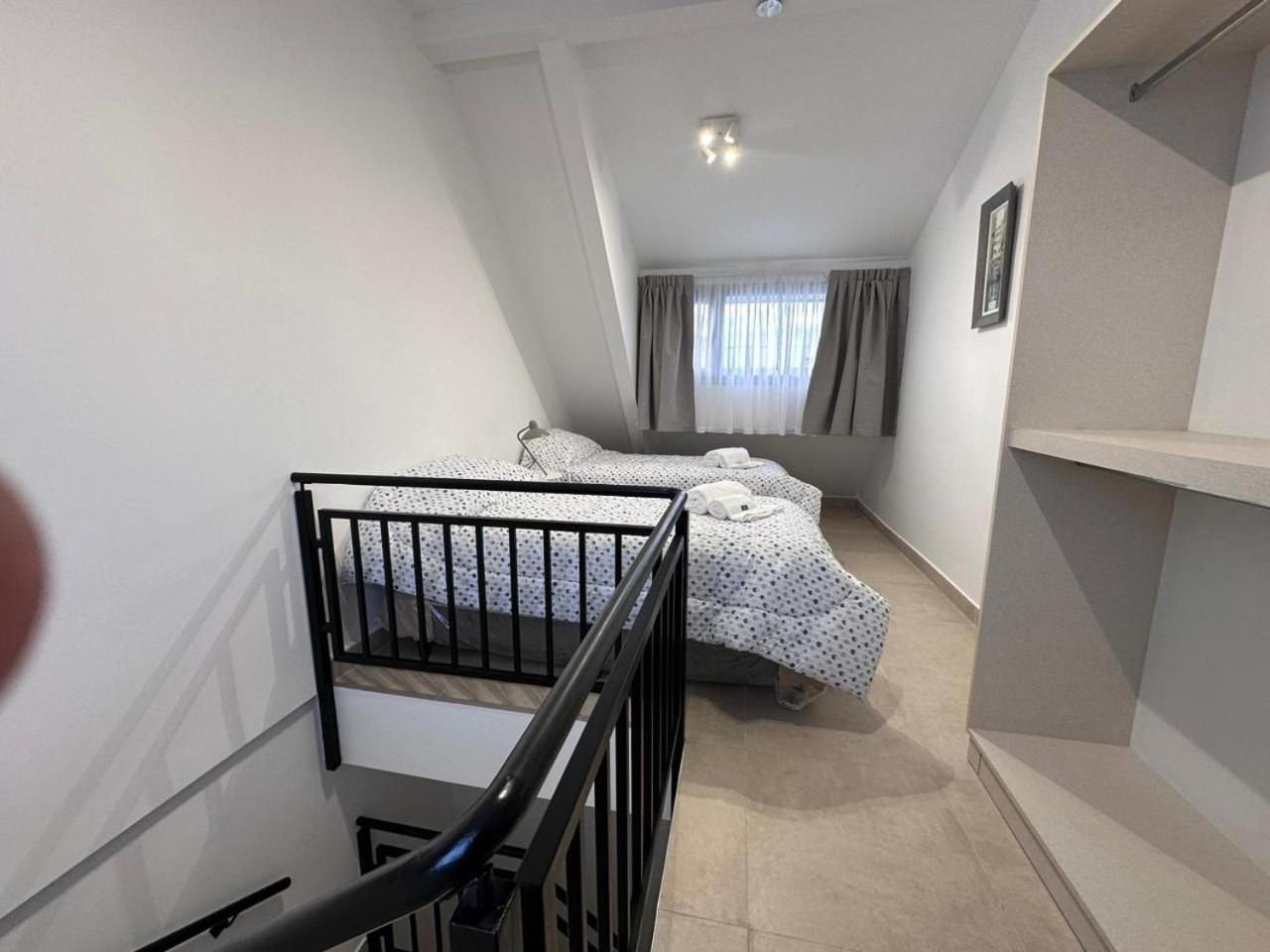 Aunaisin - Apartamentos 9 de julio 52