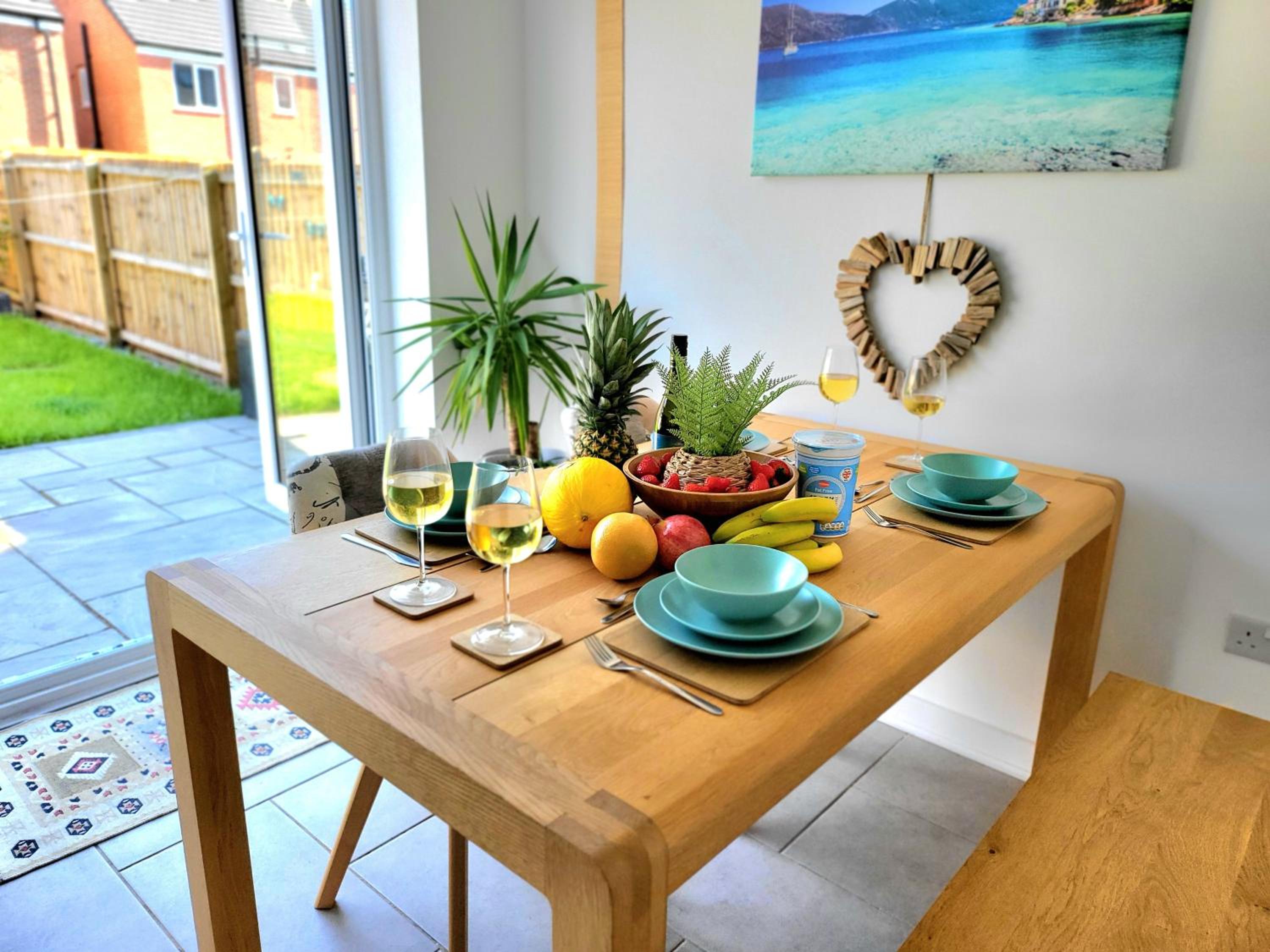 Seaside beach themed home with garden and driveway view 2