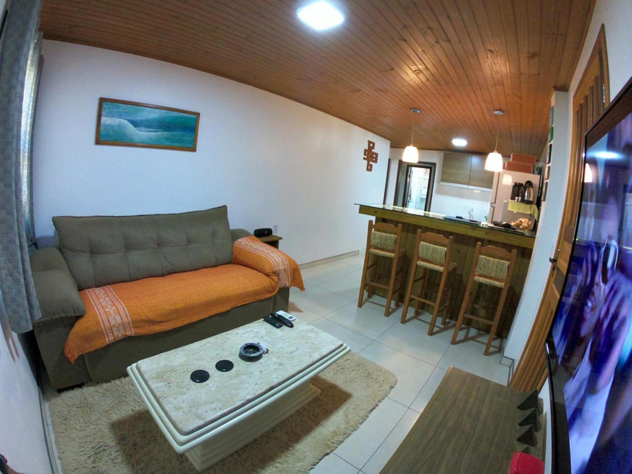 Casa privativa com piscina na Praia da Ferrugem duas quadras mar REF 100