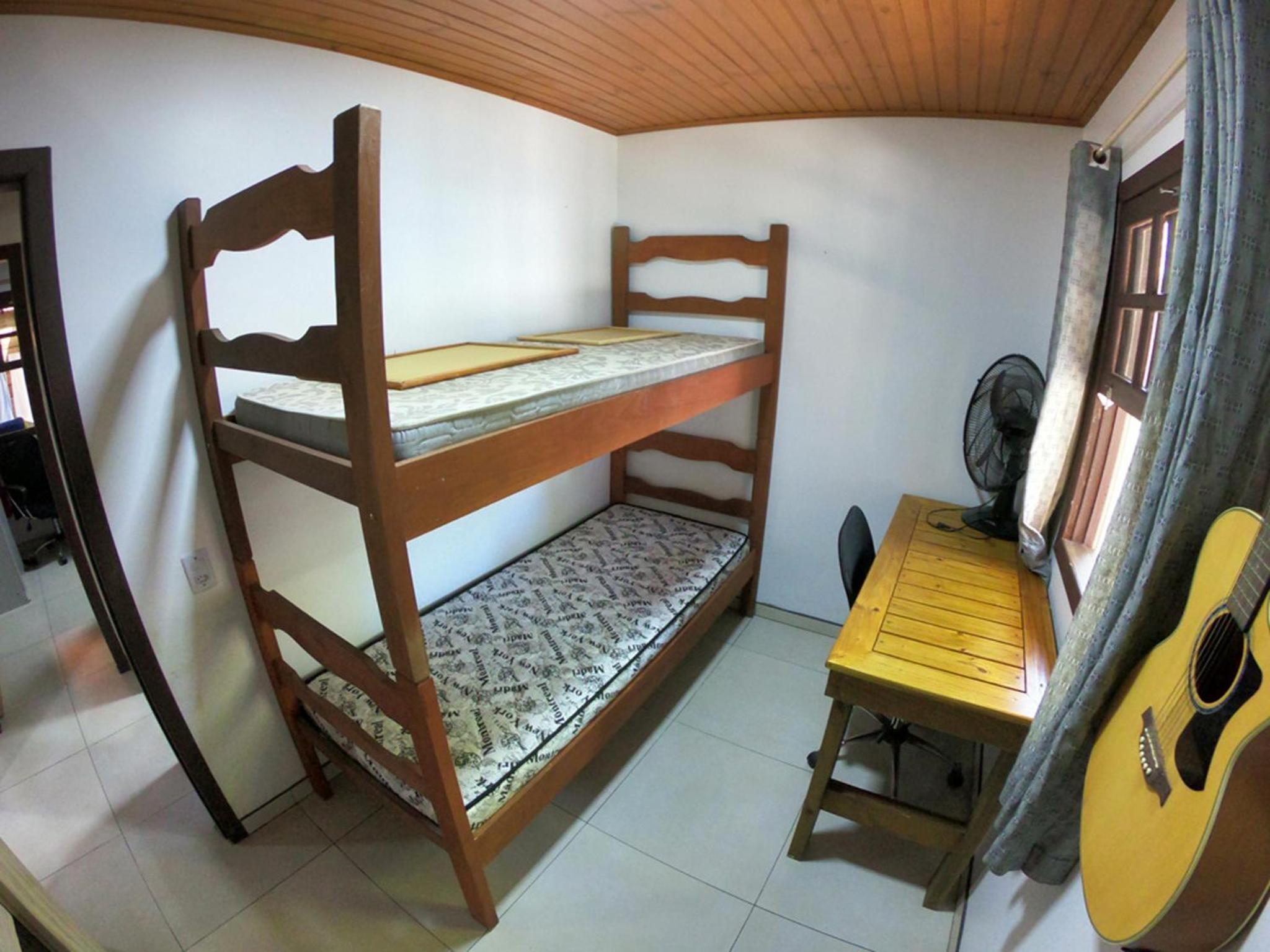 Casa privativa com piscina na Praia da Ferrugem duas quadras mar REF 100