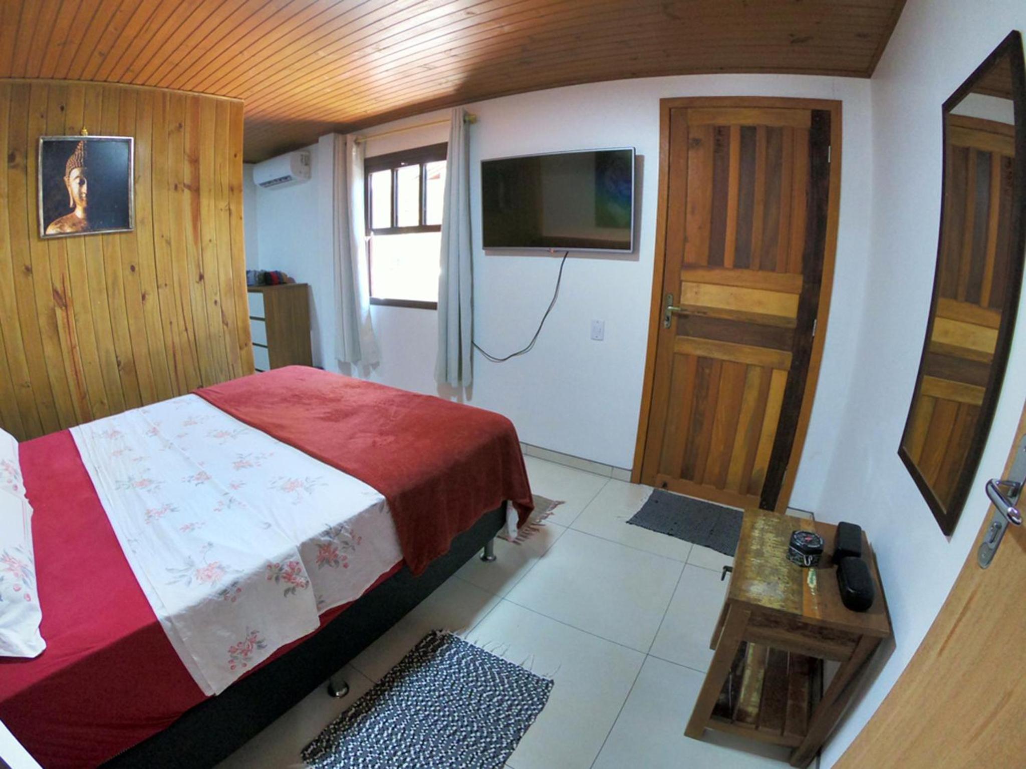 Casa privativa com piscina na Praia da Ferrugem duas quadras mar REF 100