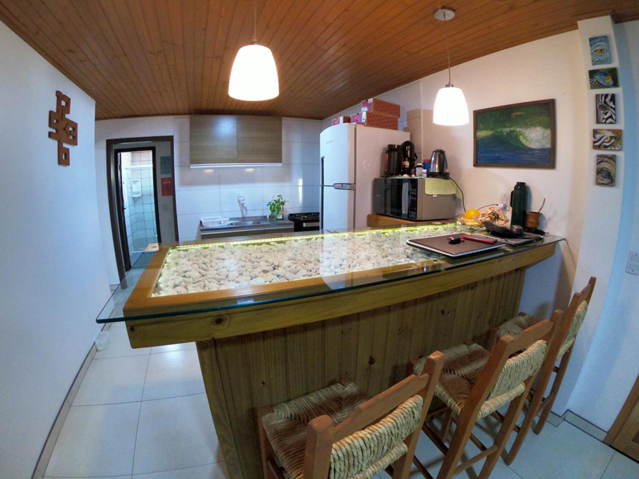 Casa privativa com piscina na Praia da Ferrugem duas quadras mar REF 100