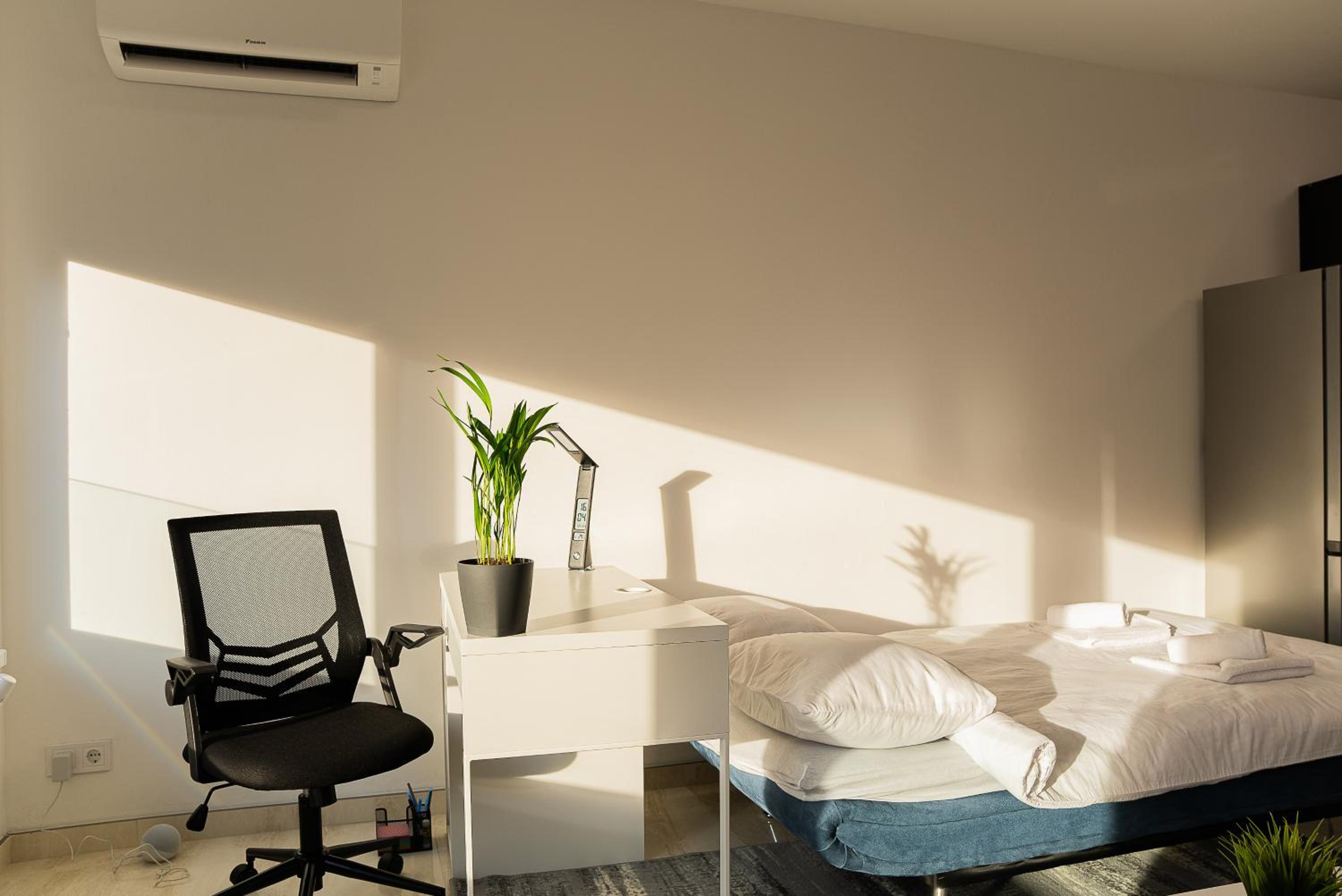 Digital Nomad Suites with Free Gym Pass and Office Setup