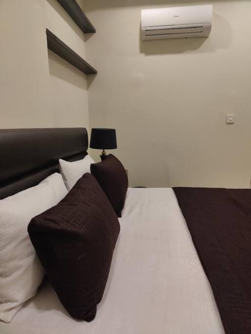 Cineplex Lodges 1BHK ISB SelfCheckin Near Airport G15 view 4