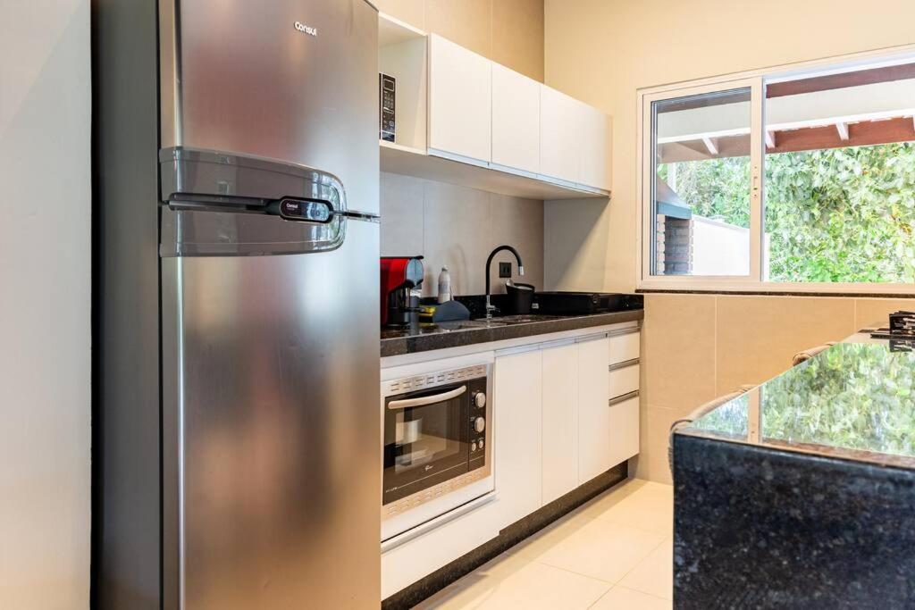 Villa Ubud - Casa com piscina privativa e vista para o mar em Ubatuba