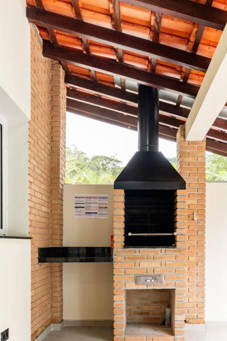Villa Ubud - Casa com piscina privativa e vista para o mar em Ubatuba