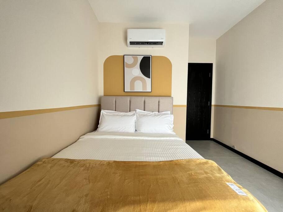 Homey Hideout at Neu Suites