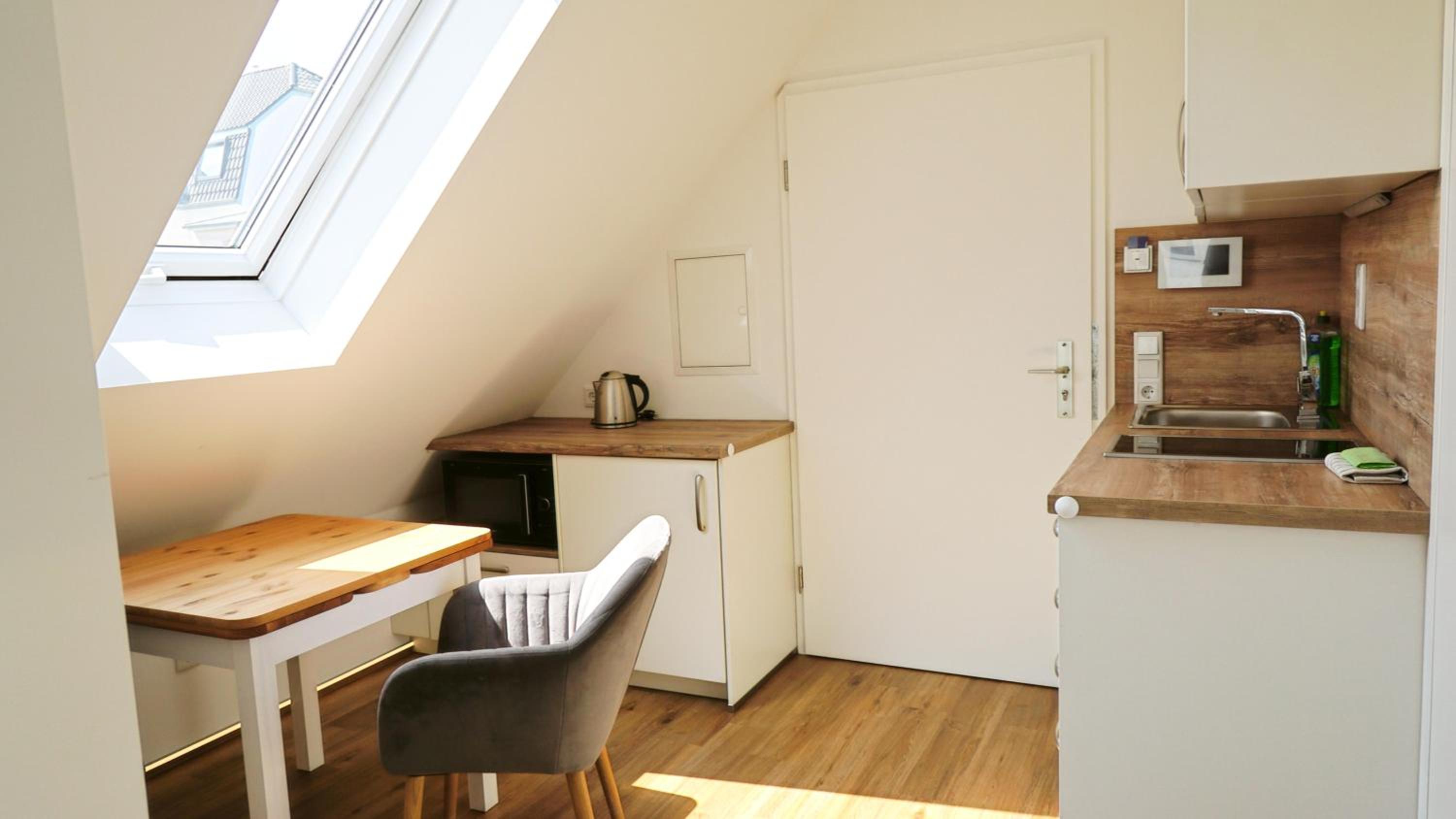 LIGHTHOUSE HOMES - moderne Ferienwohnungen mit Terrasse am Kirchenplatz