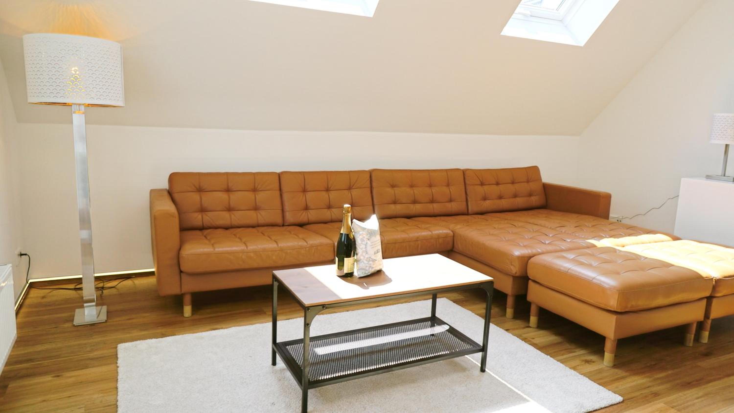 LIGHTHOUSE HOMES - moderne Ferienwohnungen mit Terrasse am Kirchenplatz