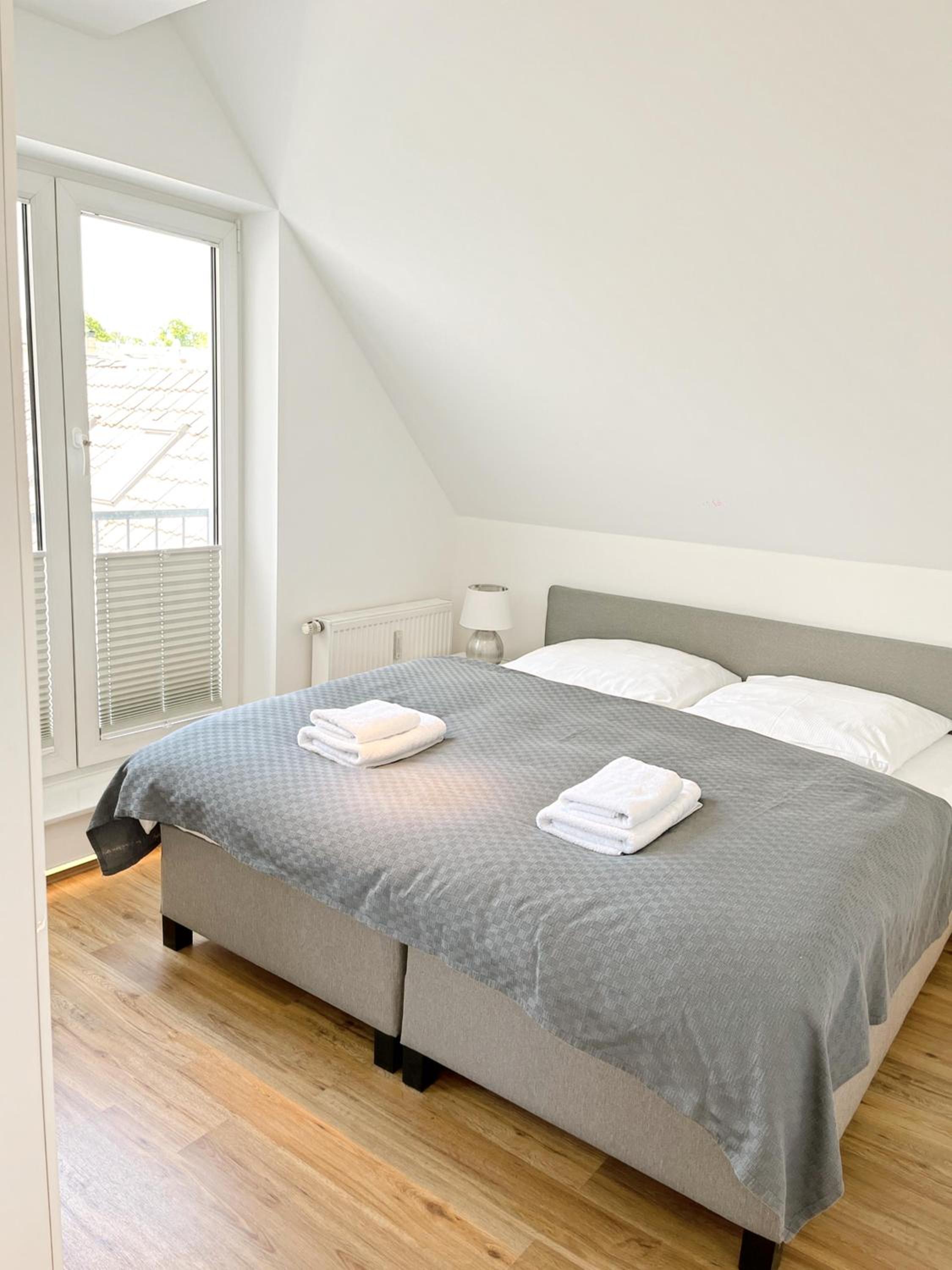 LIGHTHOUSE HOMES - moderne Ferienwohnungen mit Terrasse am Kirchenplatz