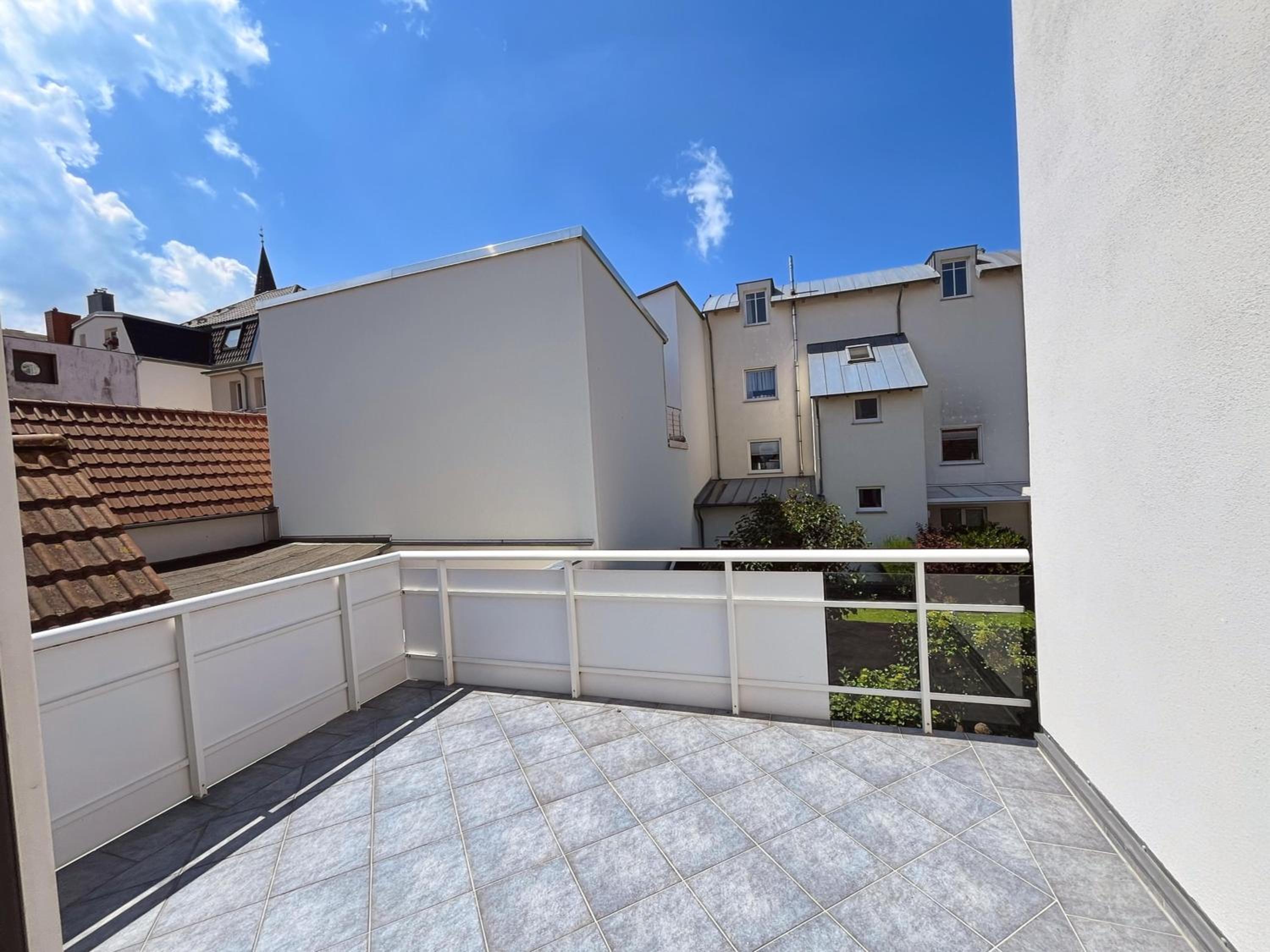 LIGHTHOUSE HOMES - moderne Ferienwohnungen mit Terrasse am Kirchenplatz