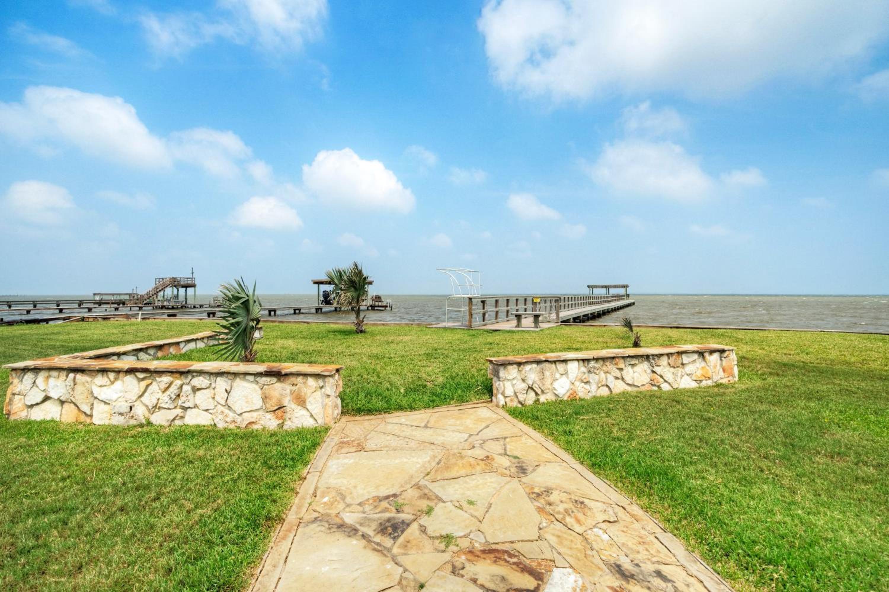 Waterfront Retreat w Private Boat Dock Patio Views Shore Thing by AvantStay