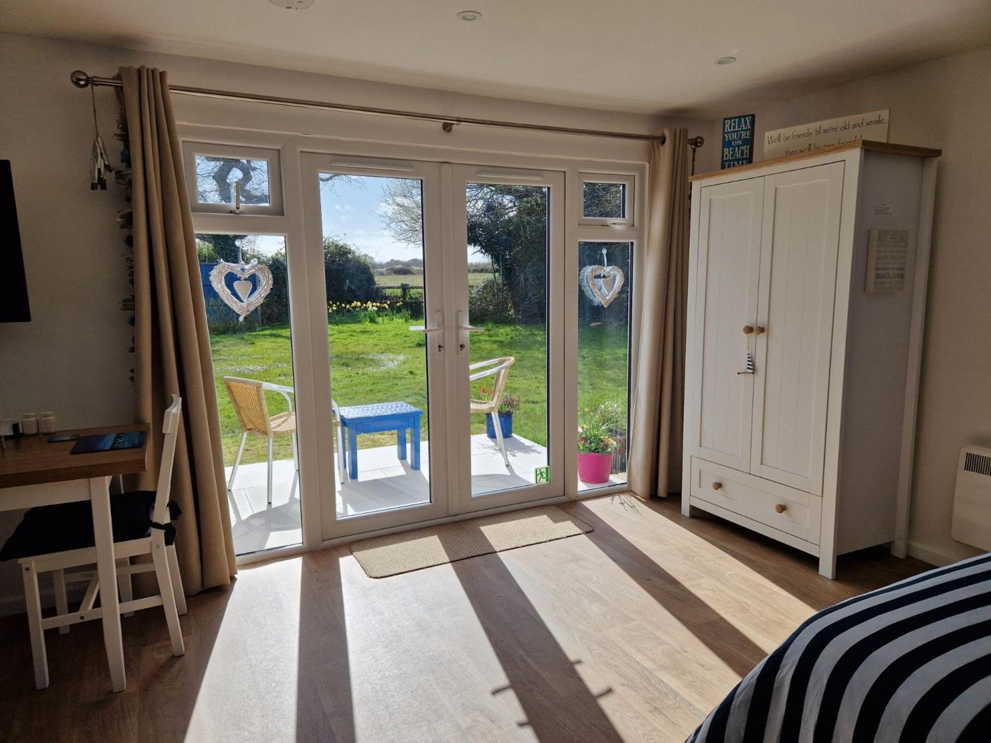 Nautical themed Guest House with patio and treehouse view 3
