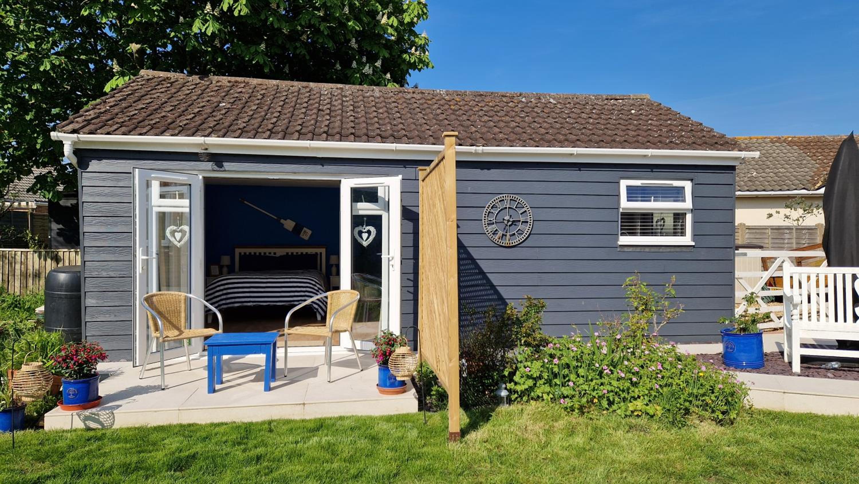 Nautical themed Guest House with patio and treehouse view 5