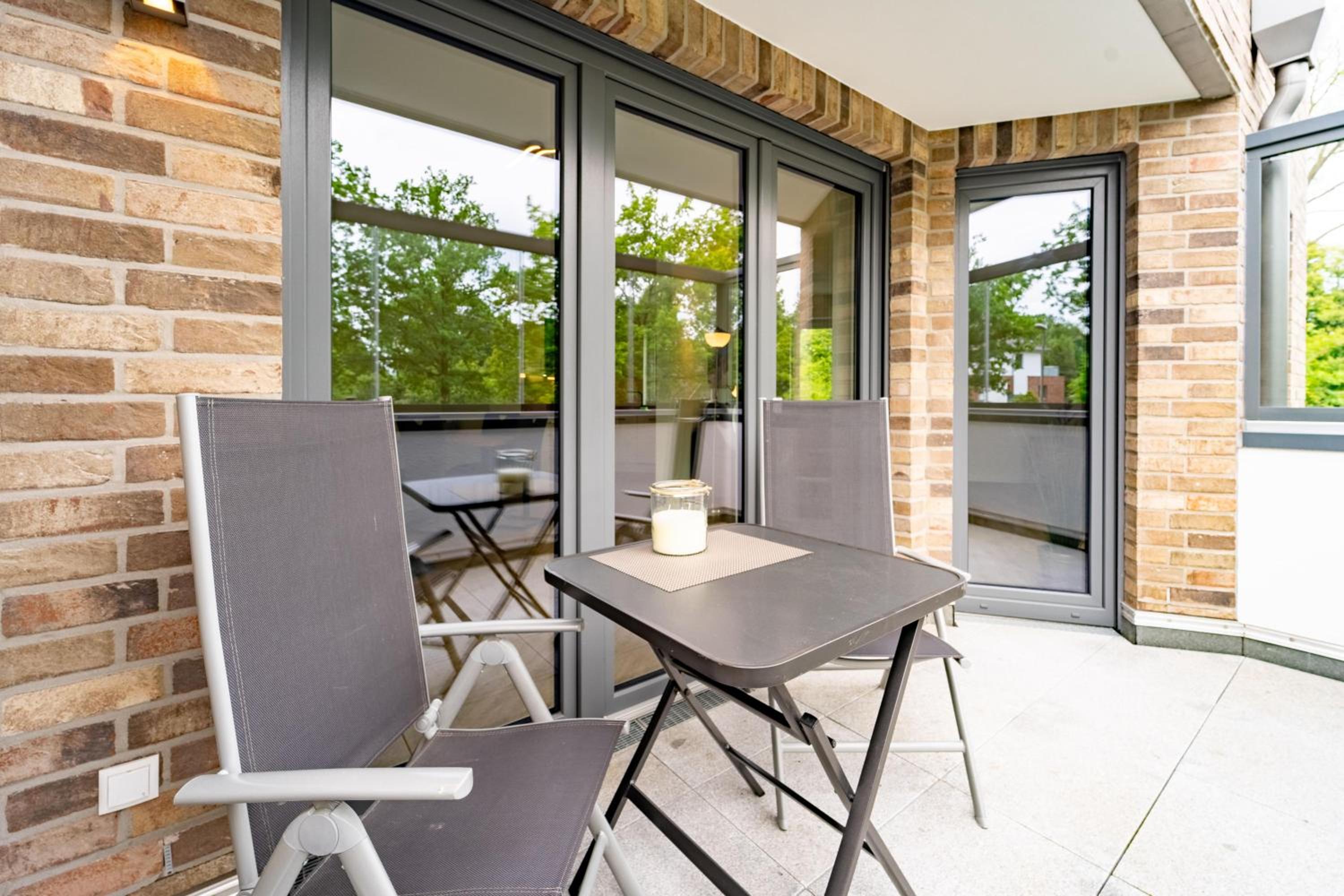 Moderne Ferienwohnung mit SUPs, Balkon und Parkplatz