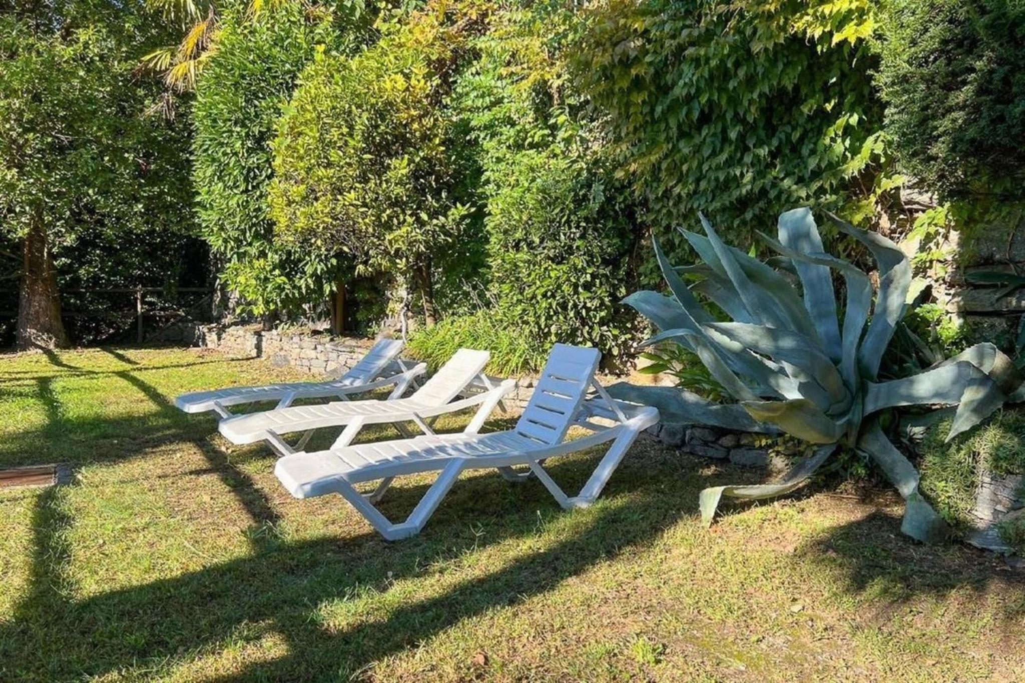 Sonnige Gartenwohnung mit Pool und Panoramasicht