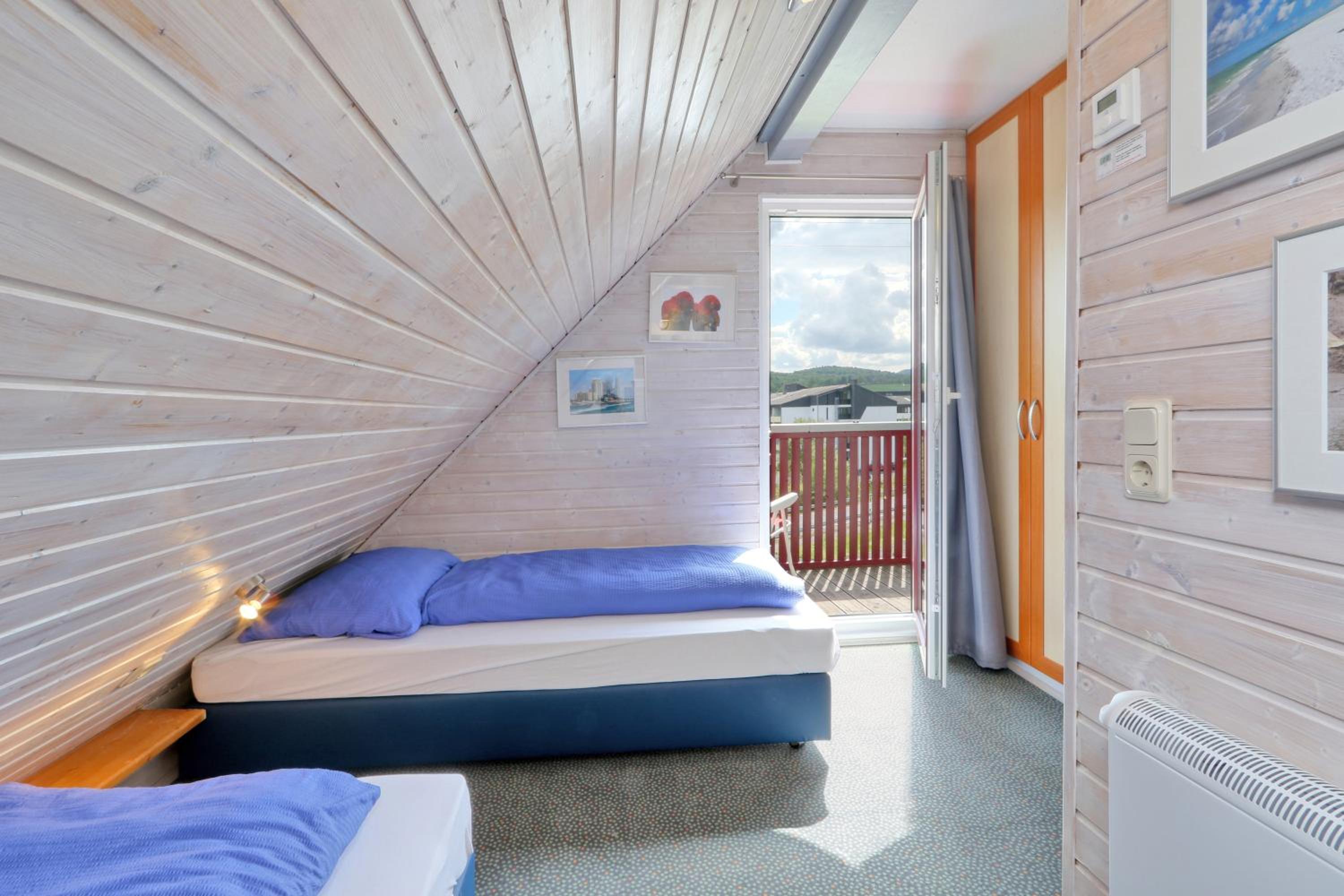 Ferienhaus 22 mit Seeblick und Garten bis 6 Personen
