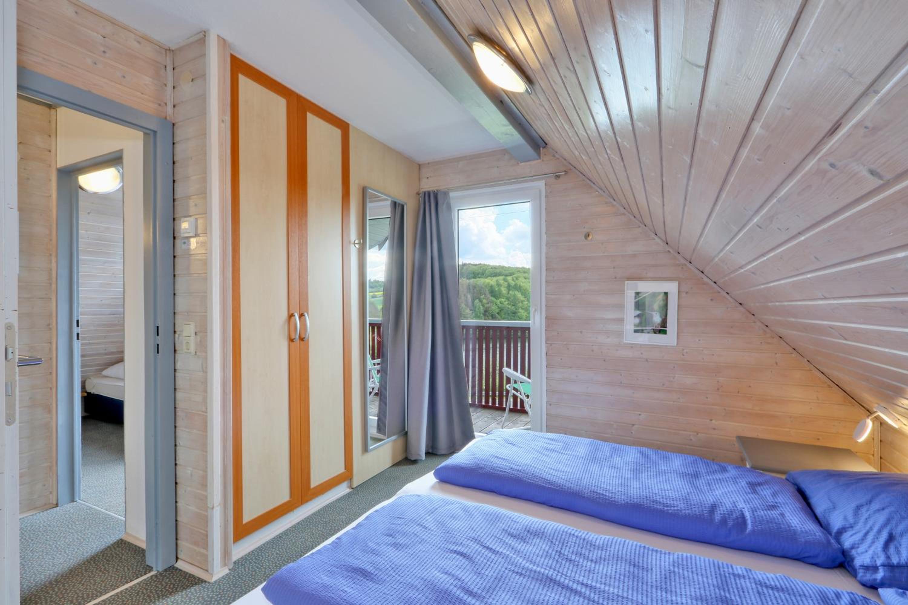 Ferienhaus 22 mit Seeblick und Garten bis 6 Personen